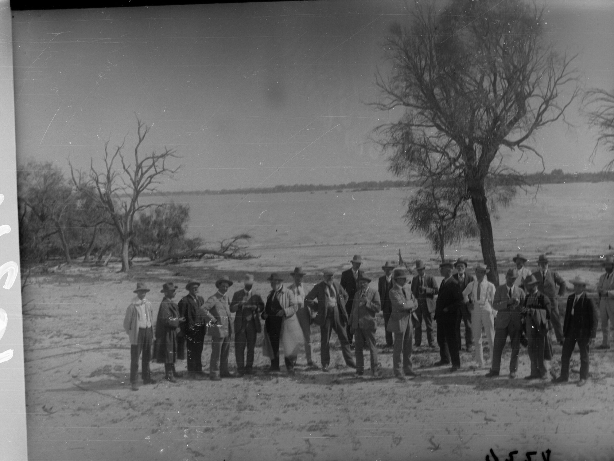 Men on the bank of River Murray