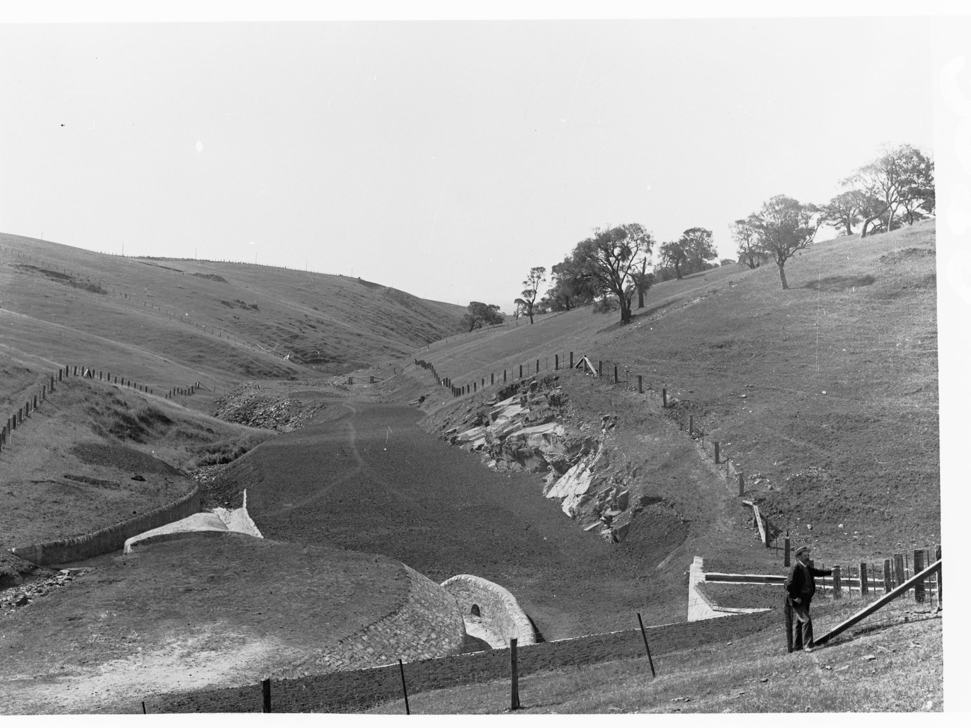 Happy Valley Waterworks - men working on digging of pipeline