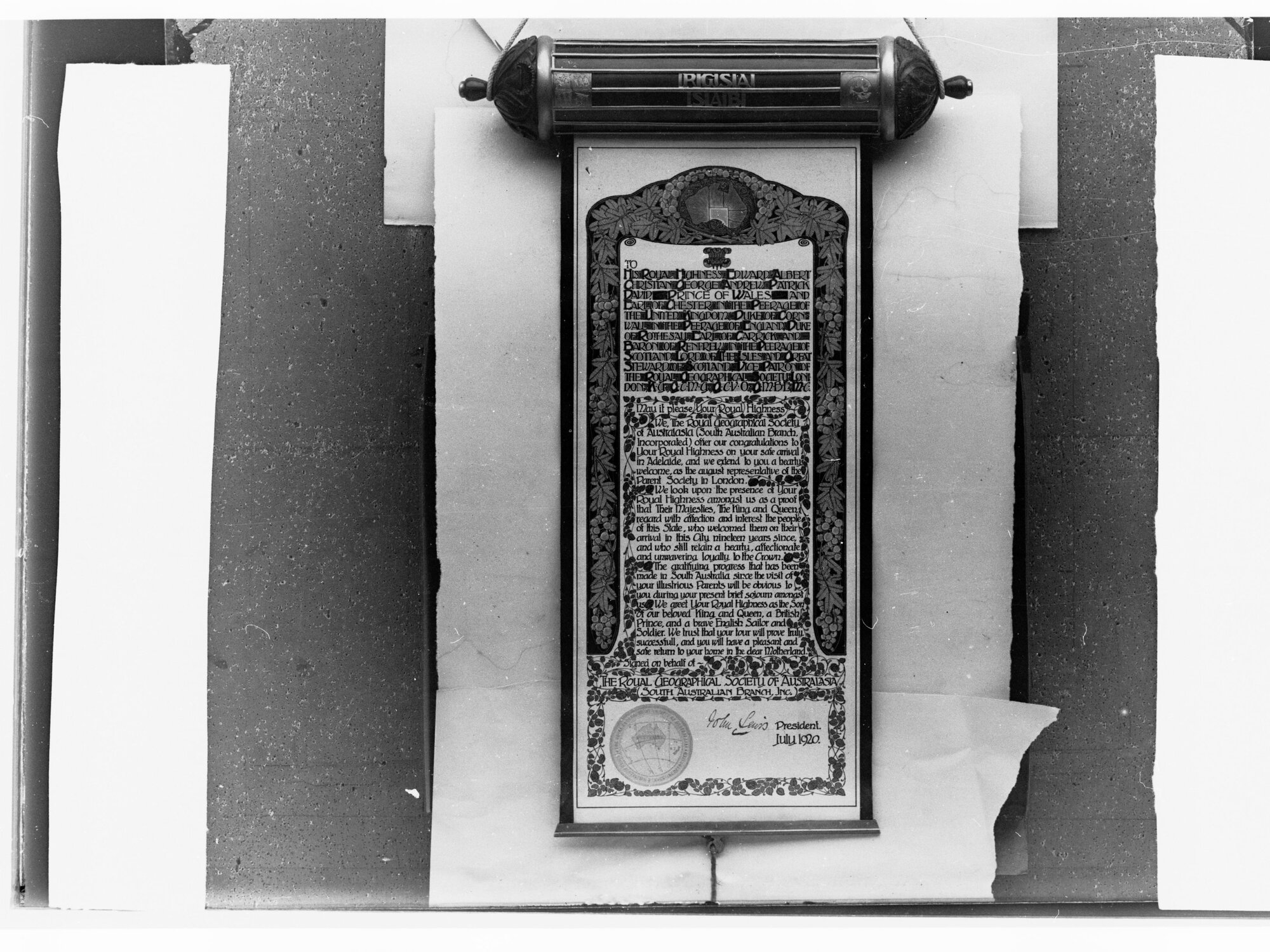 Address of welcome to the Prince of Wales from the Royal Geographical Society - Iccuminated scroll (signed at bottom by President in 1920)