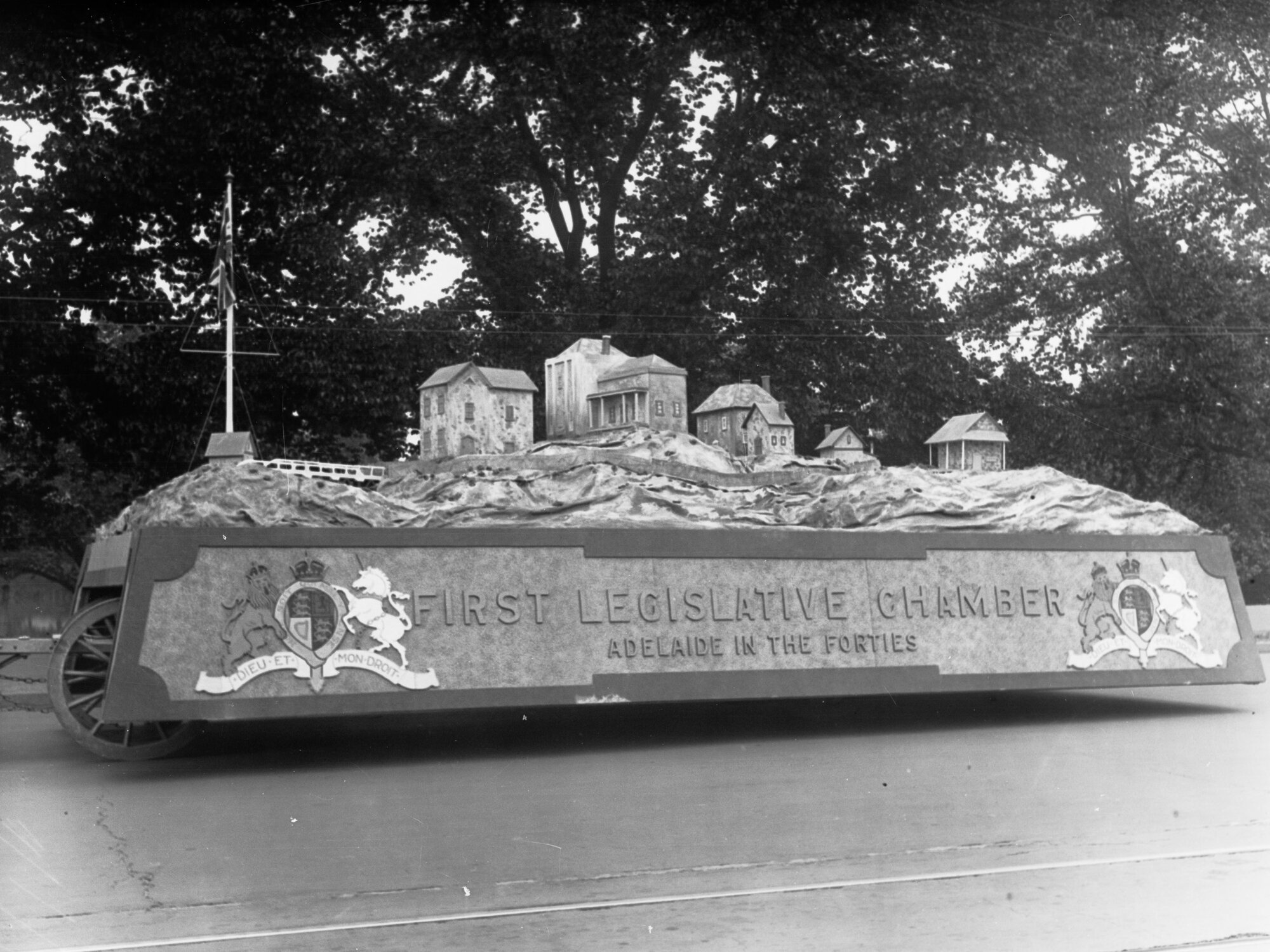 Pageant of progress showing first legislative chamber float