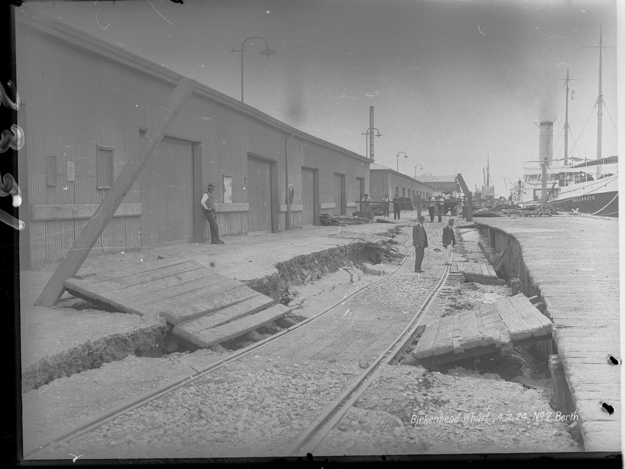 Birkenhead Wharf No. 2 Berth - shows steamship Argonauta berthed at wharf and also shows subsidence in roadway
