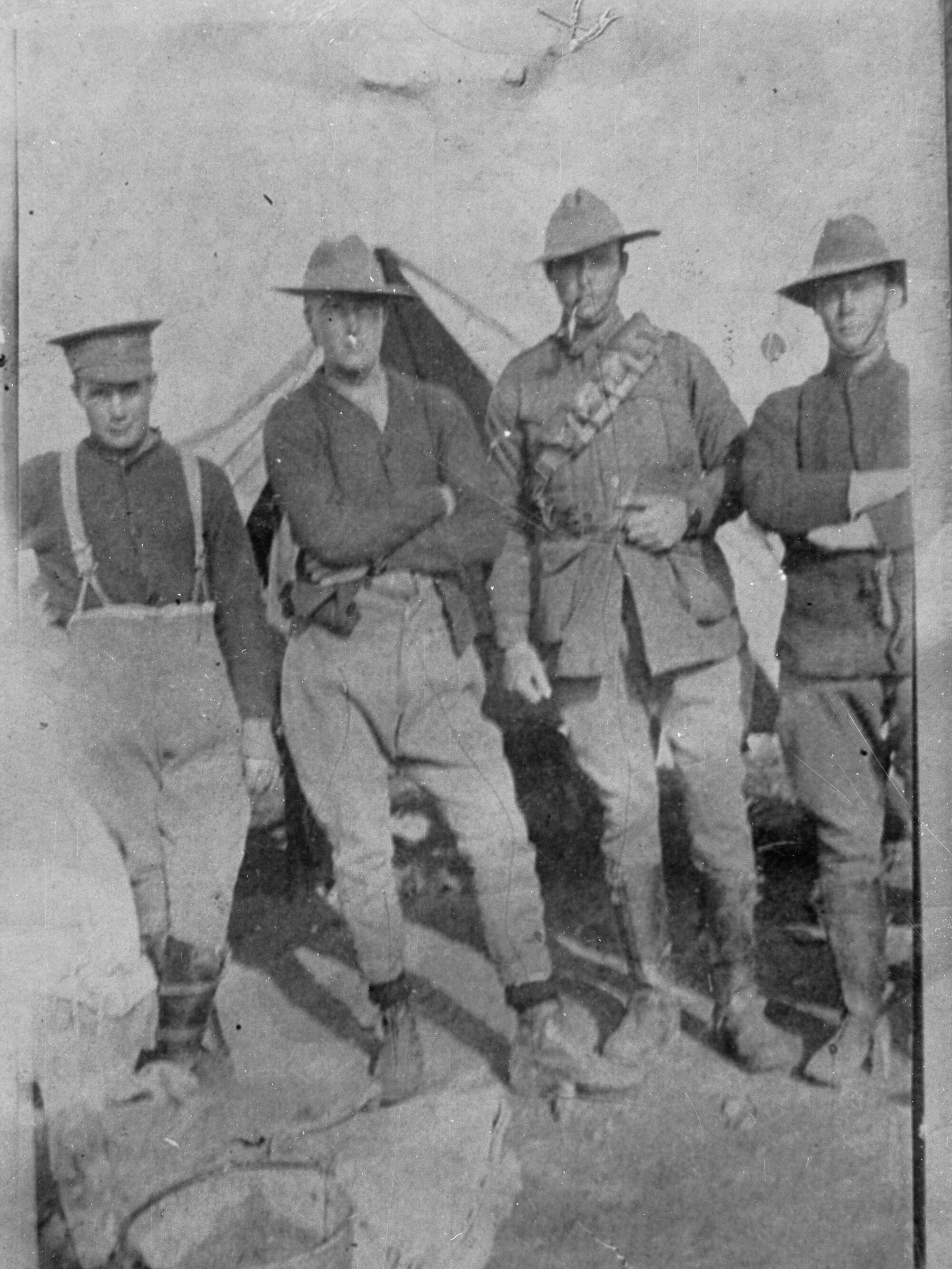 View of four men in military uniform 