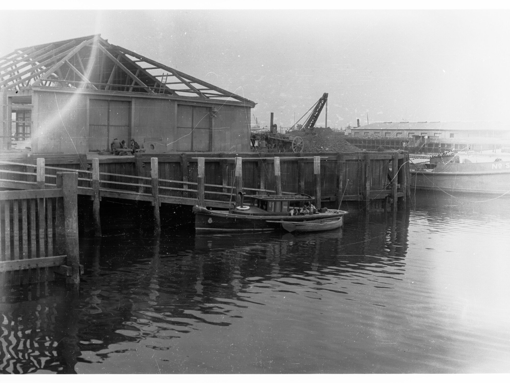 Port Adelaide Wharf Showing Building not Fully Constructed and Small Boat in Water