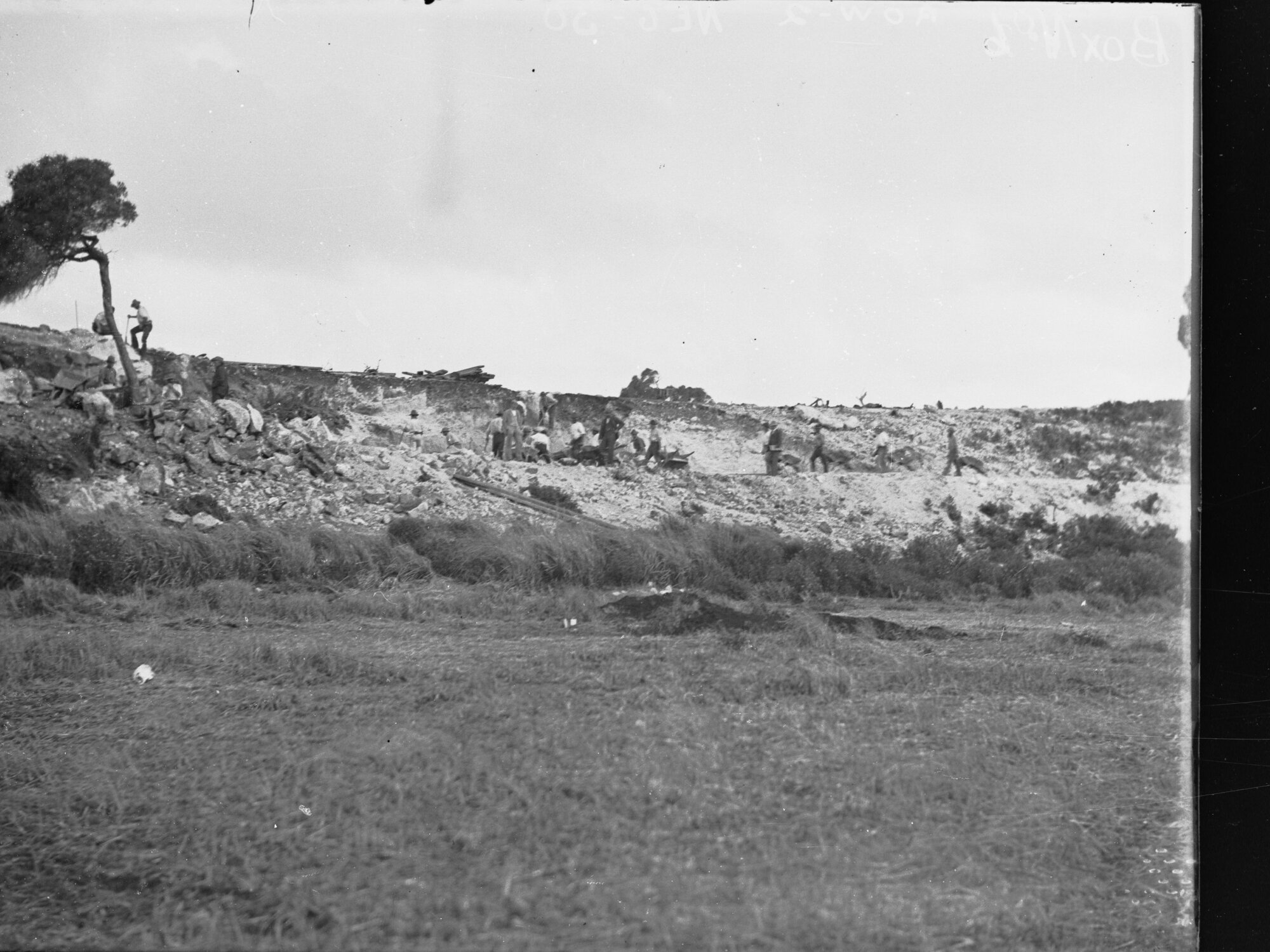 People Working on a Hillside