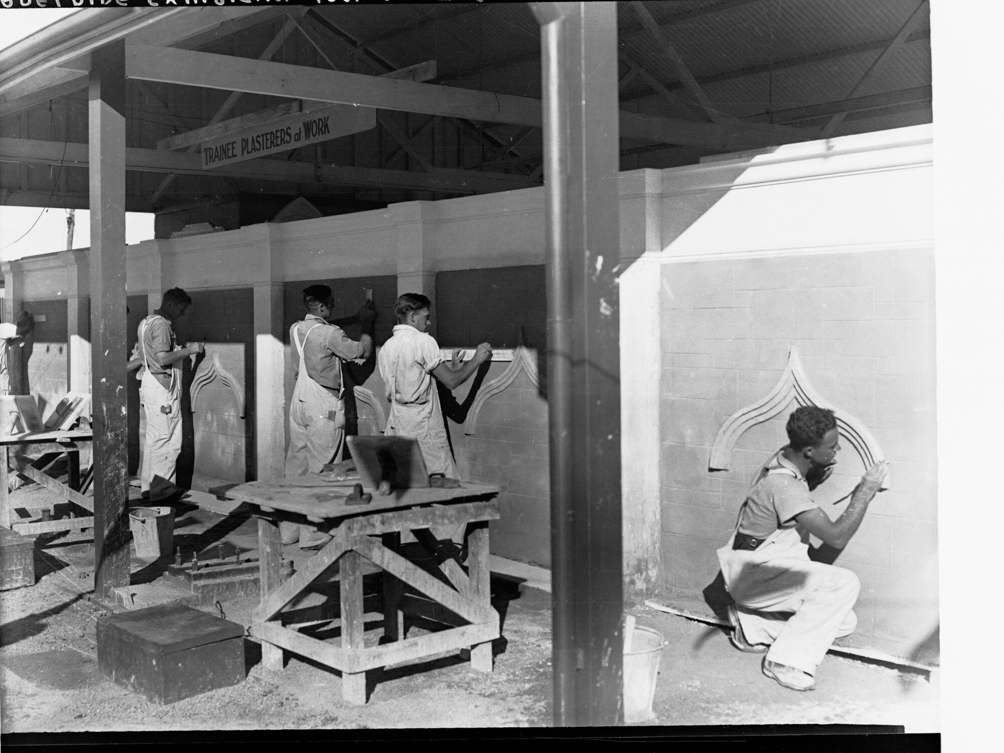 Trainee Plasterers at Work