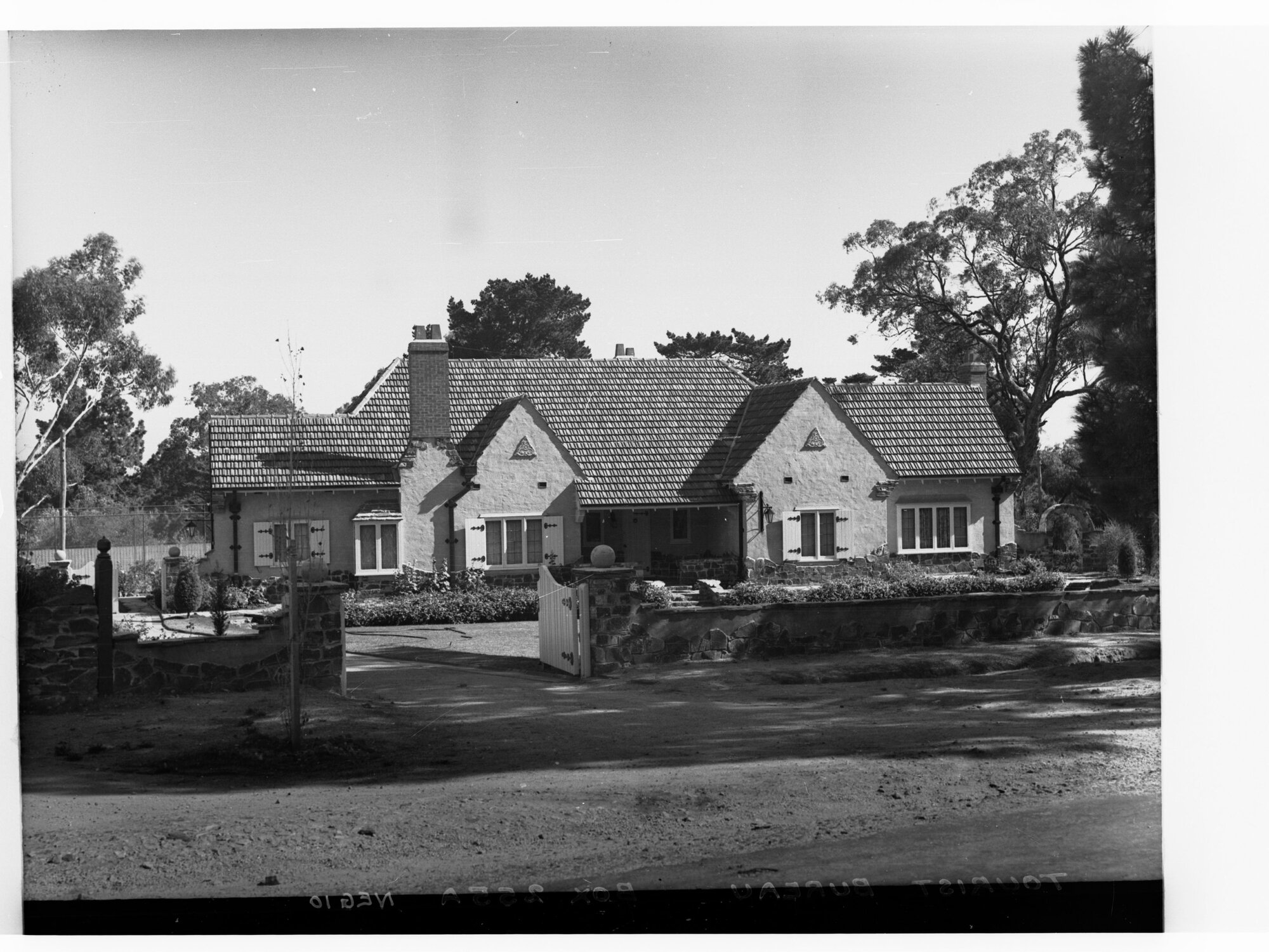Tourist Bureau showing large house