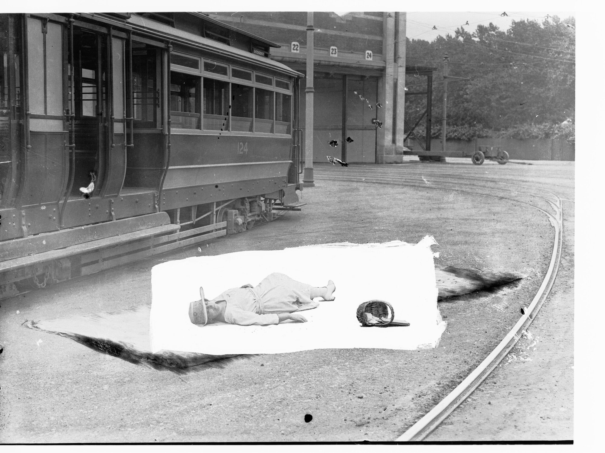Simulation of tram accident - showing lady lying on ground next to tram