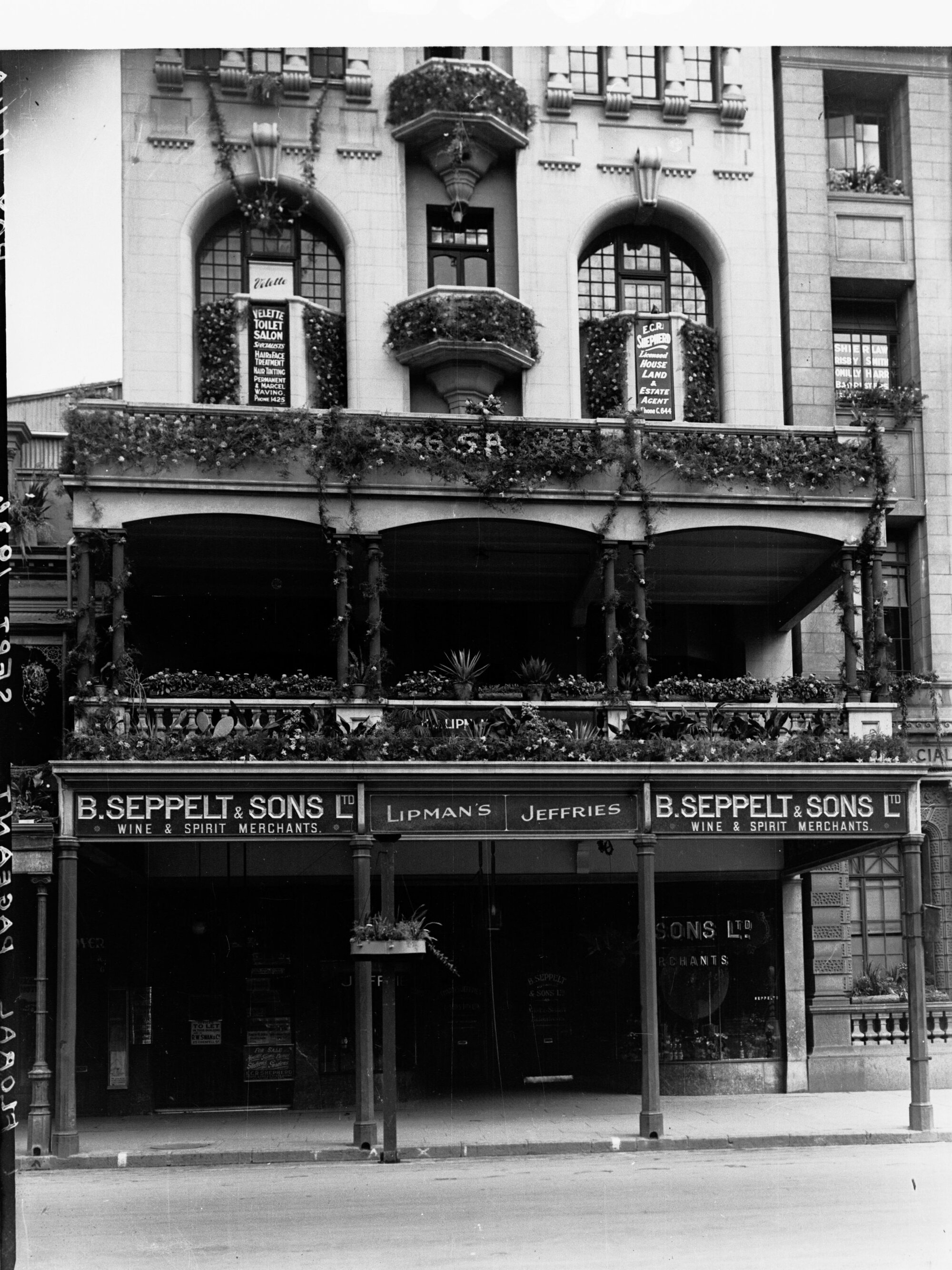 Kithers Building King William street decorated for state centenary (Kithers building houses Seppelts and Sons wine and spirit merchants)