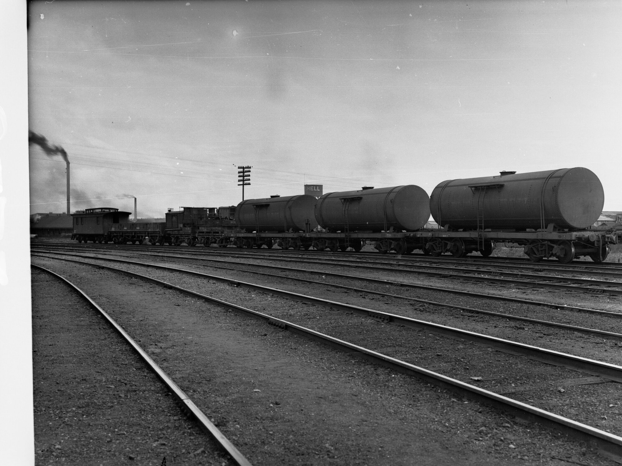 Mile End train showing containers for poisonous substances