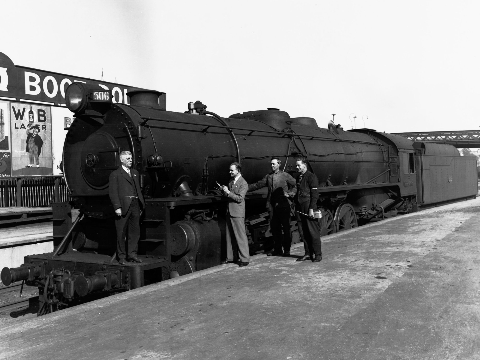 Mr A N Day Standing on the Front of a Locomotive Engine