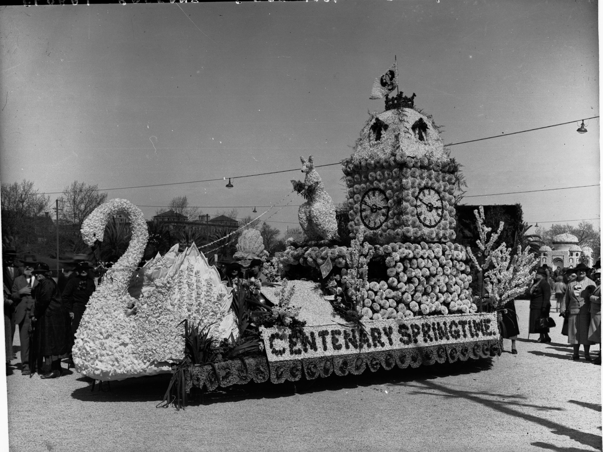 Adelaide Centenary floats for floral pageant, float depicts GPO tower, a kangaroo and large swan