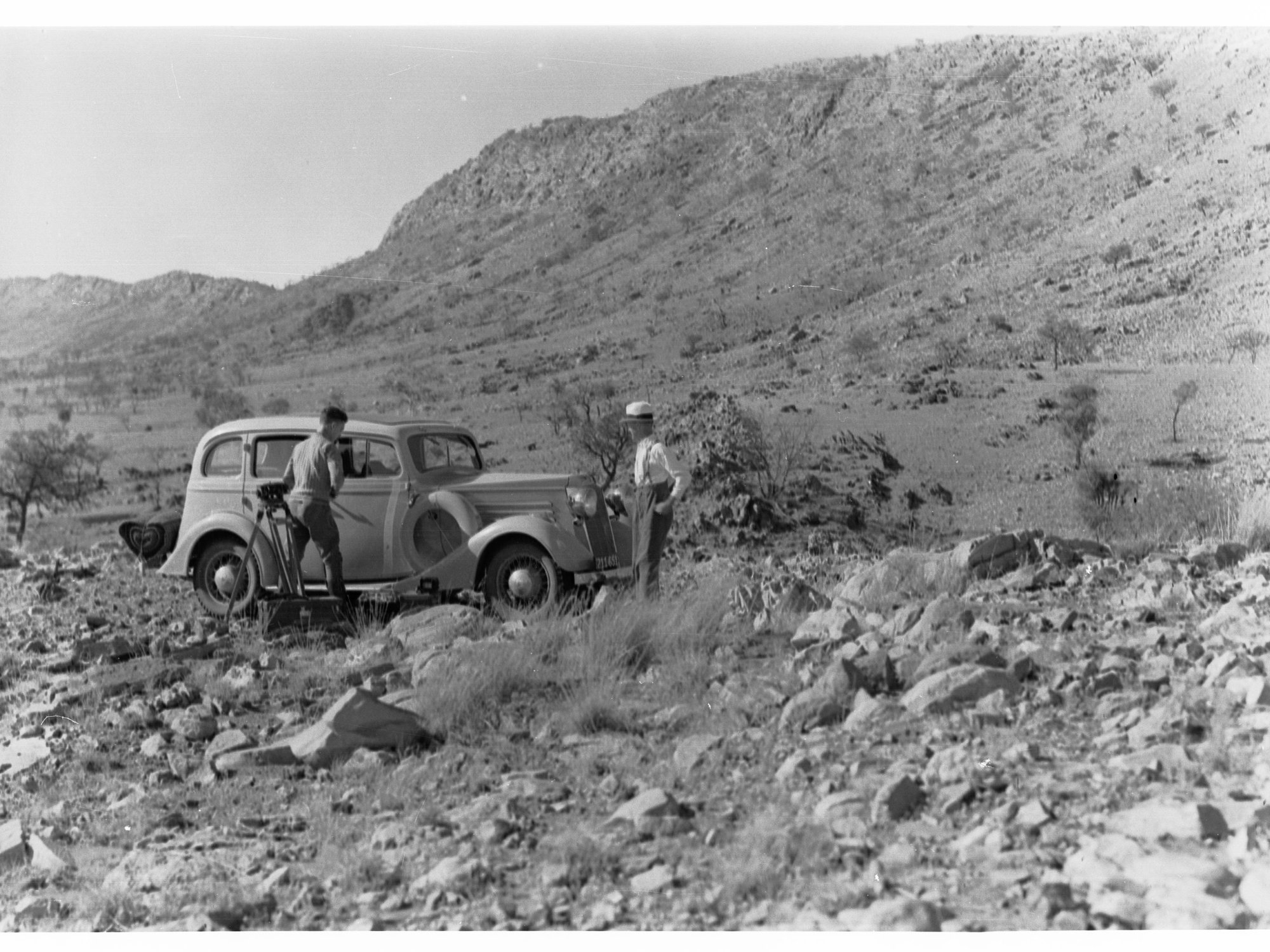 MacDonnell Range Showing Two Men With Photographic Equipment and Automobile Near