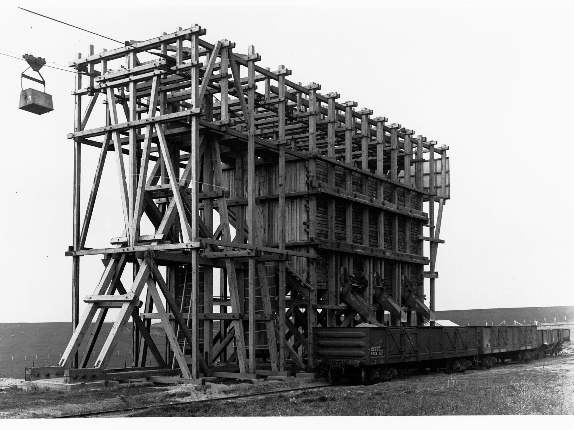 Noarlunga Sand Company loading railway trucks with sand