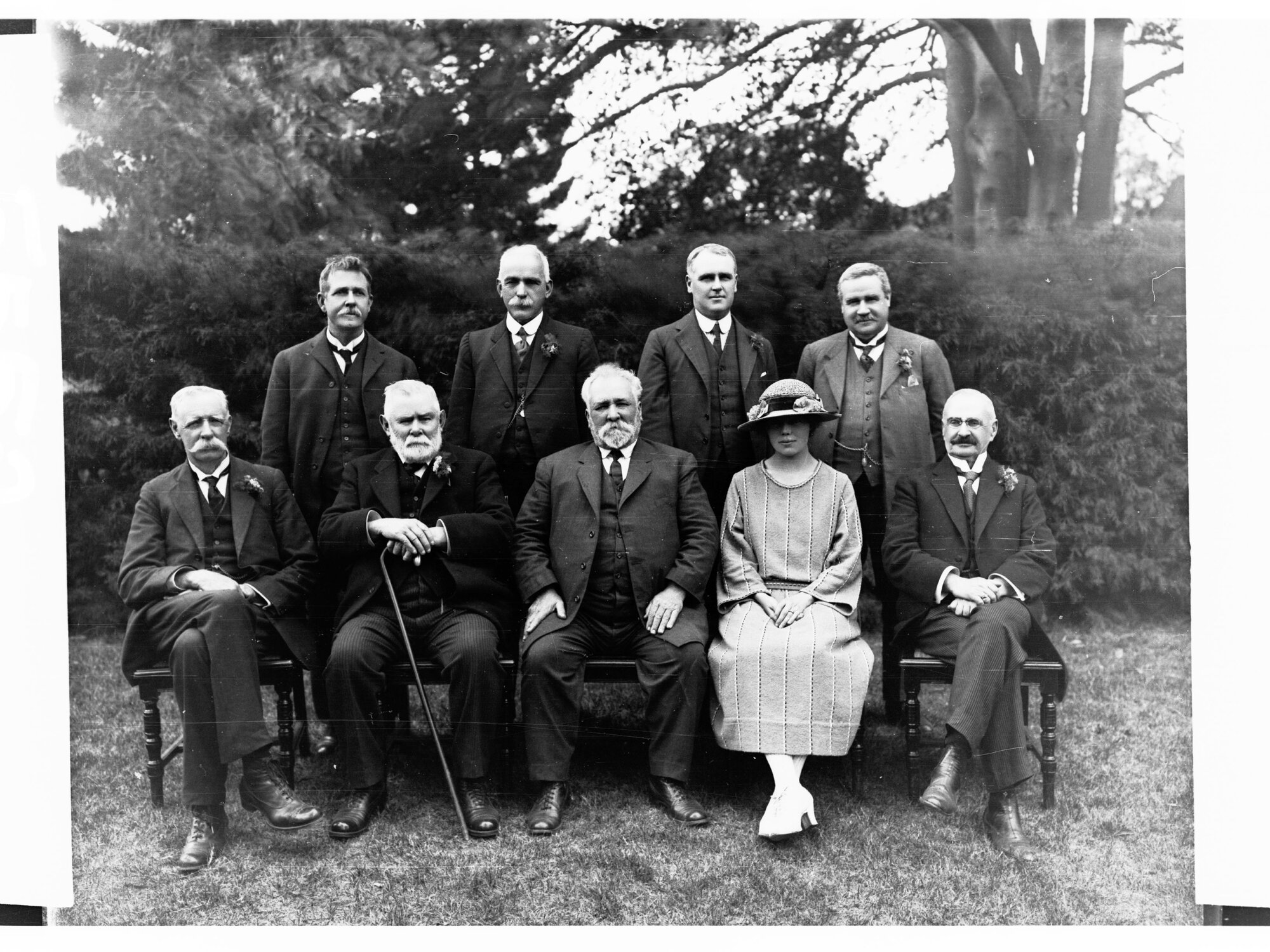 Group Photo of Identified Men WIth One Women in Front Row