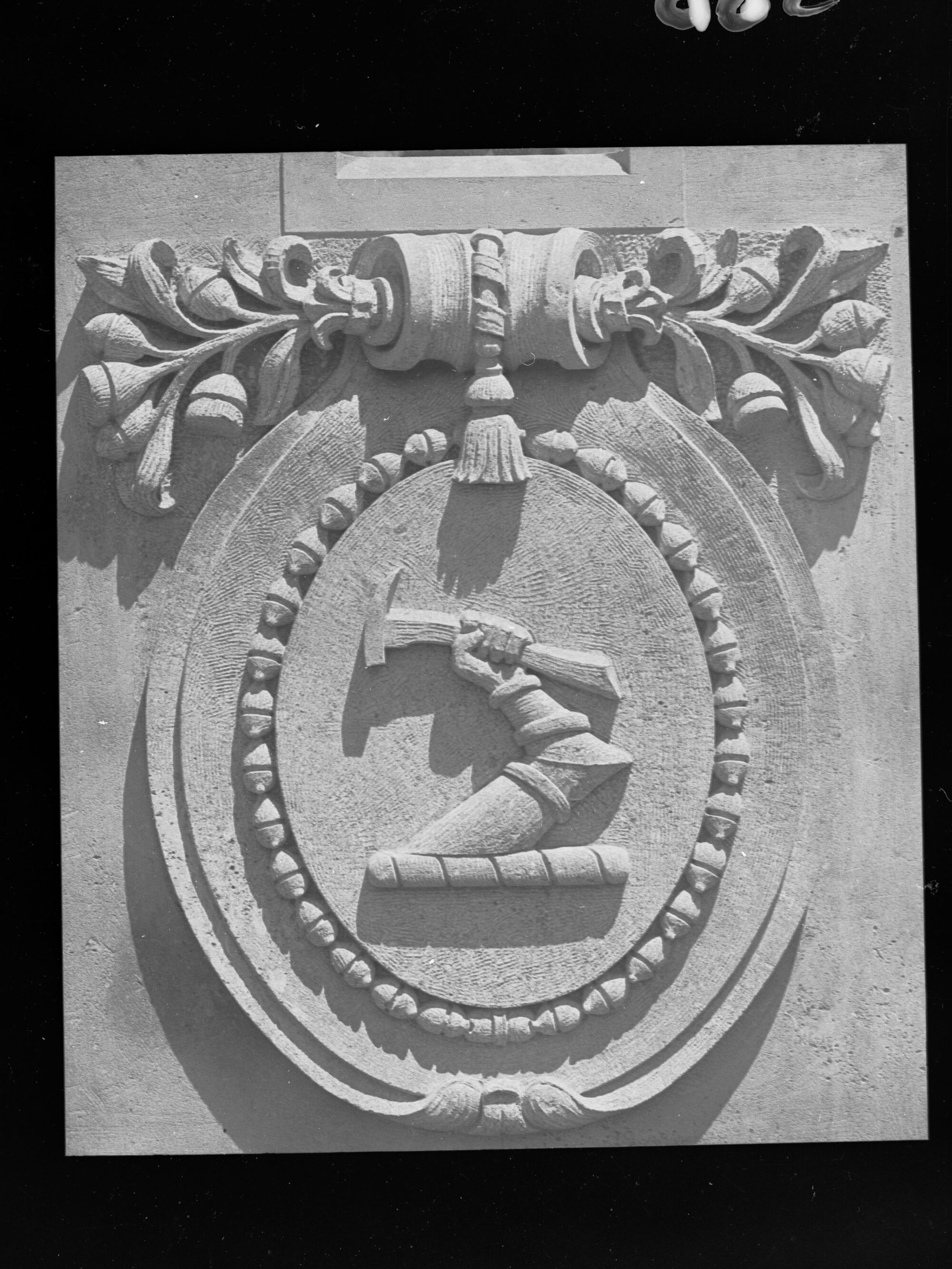 Carved stone panel for the Education Building