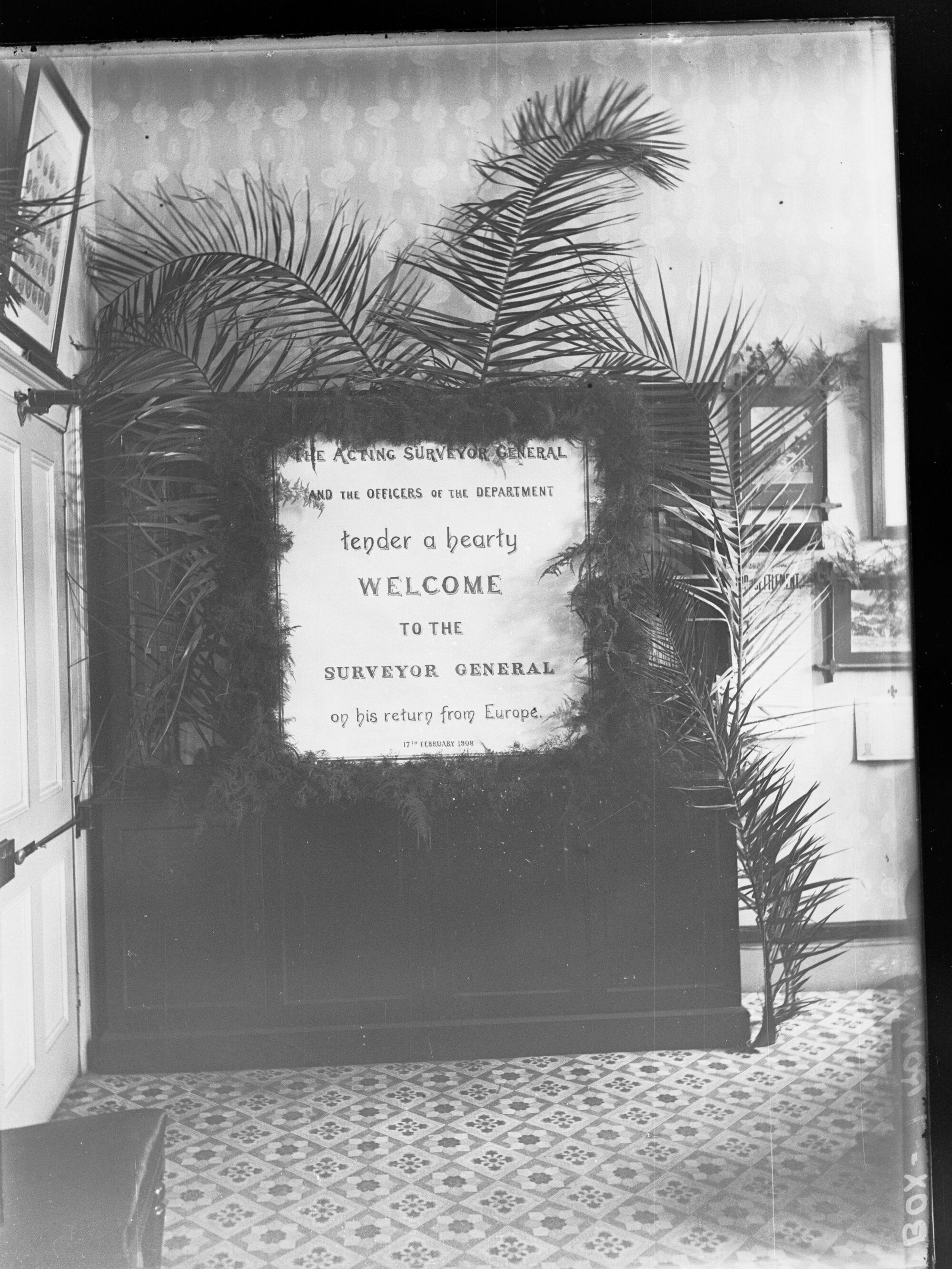 Plaque welcoming Surveyor General on his return from Europe, c. February 1908