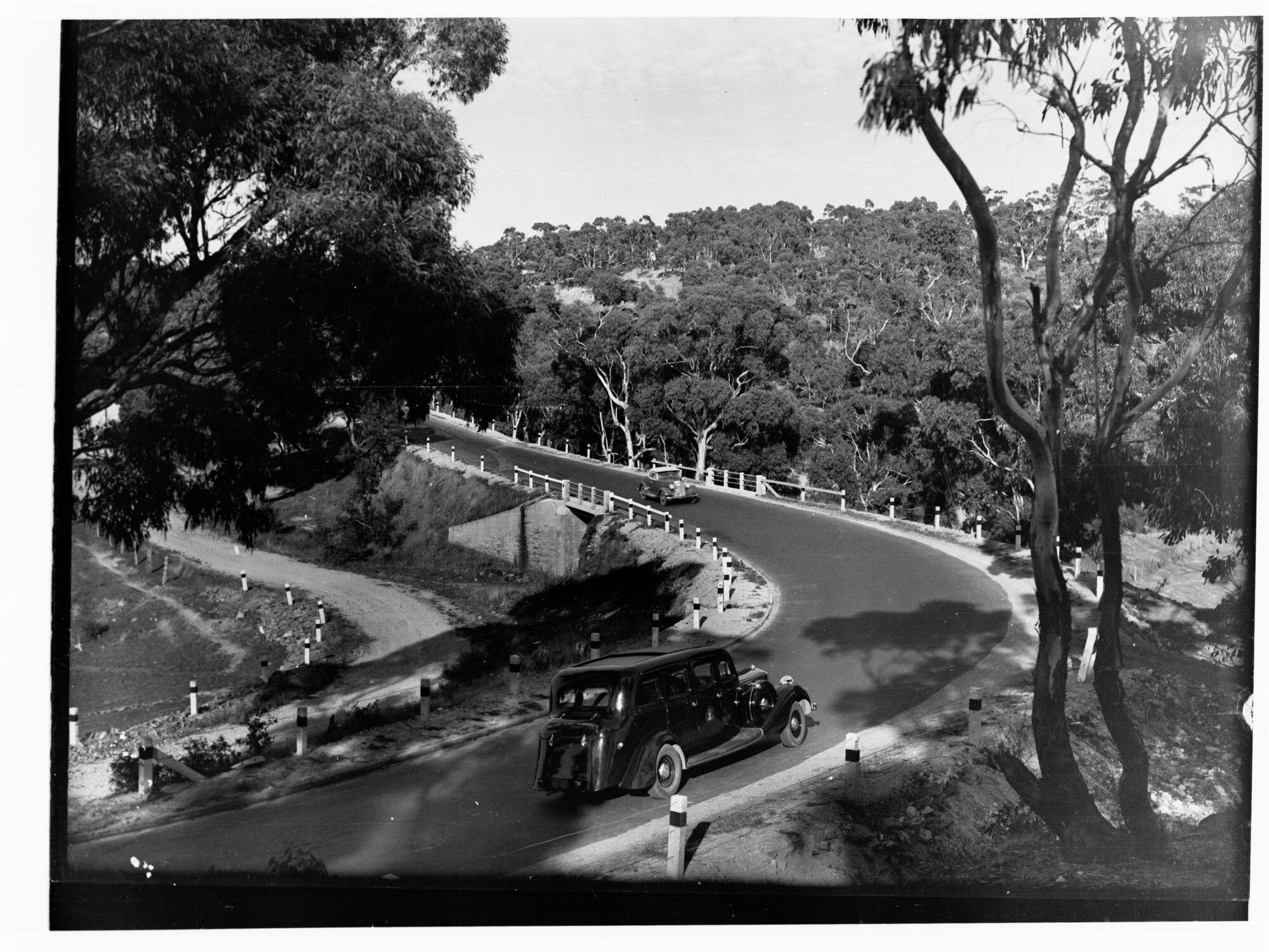 Automobiles on country road