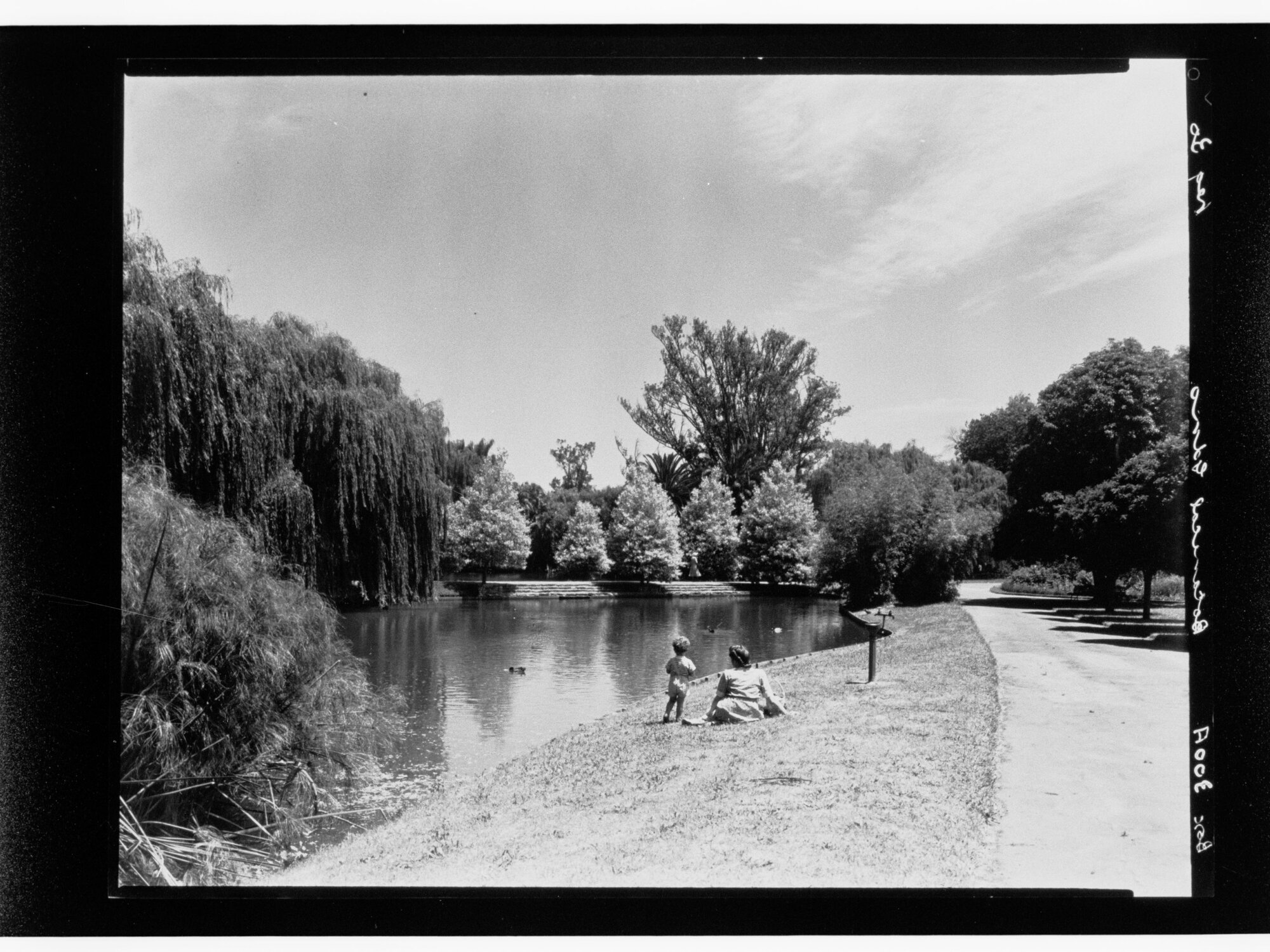 Botanical Gardens - woman and child sitting next to water