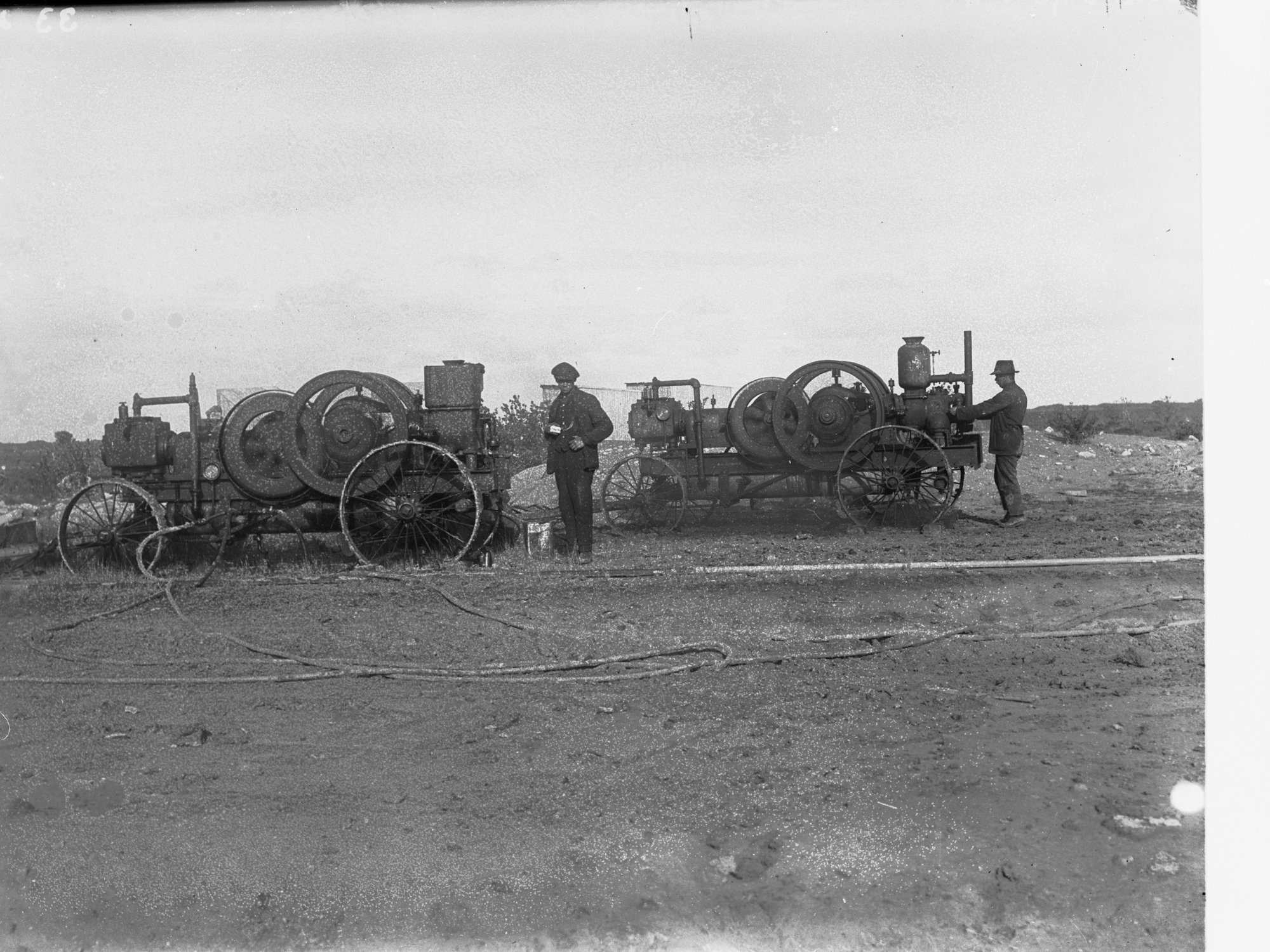 South Eastern Drainage Scheme, South Australia,  two men with Portable Air Compressors