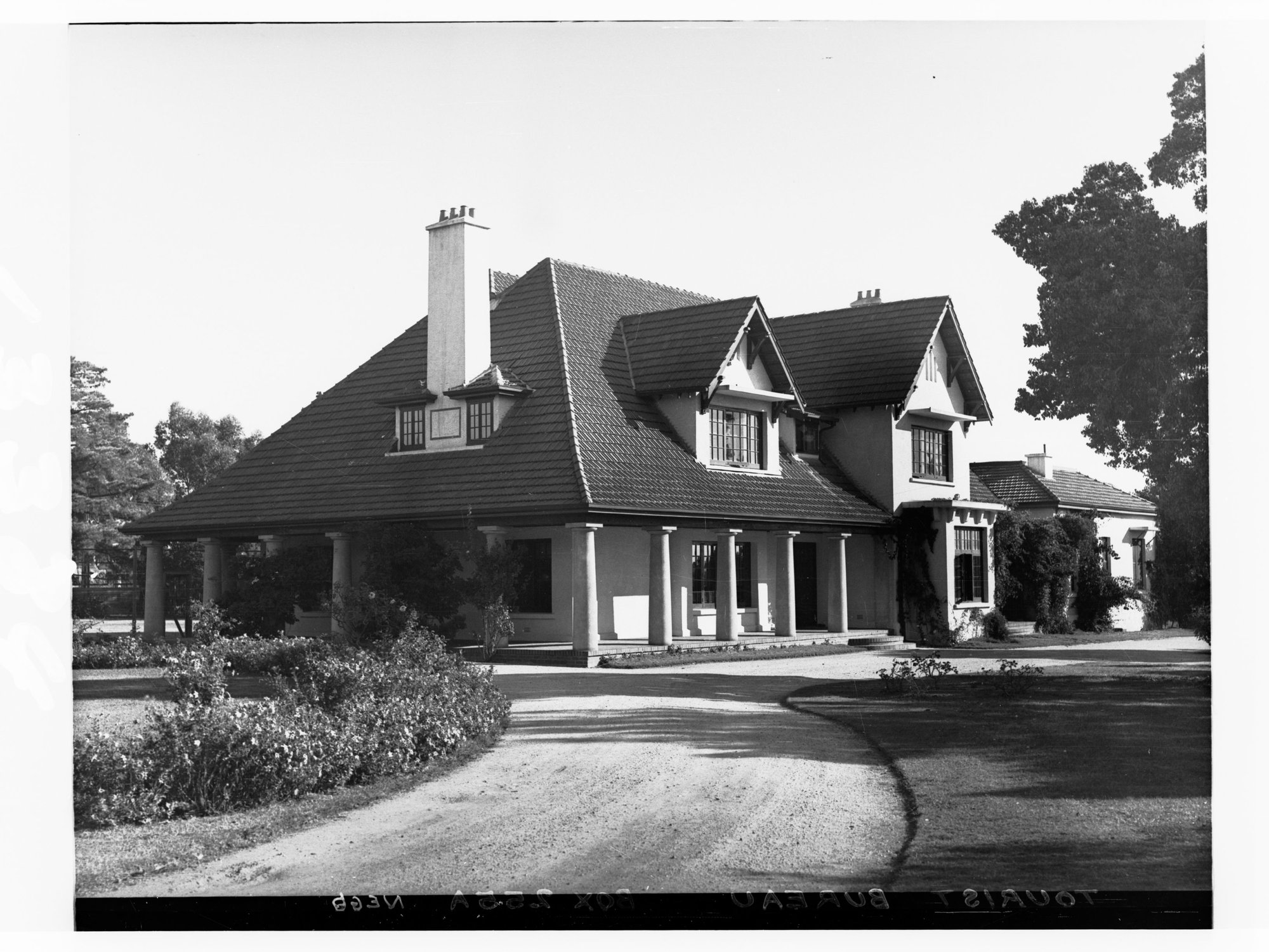 Tourist Bureau showing large house