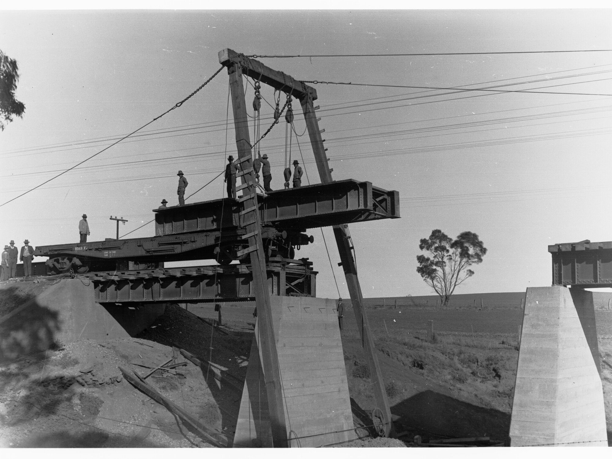 Railway Bridge over Pine Creek showing men working