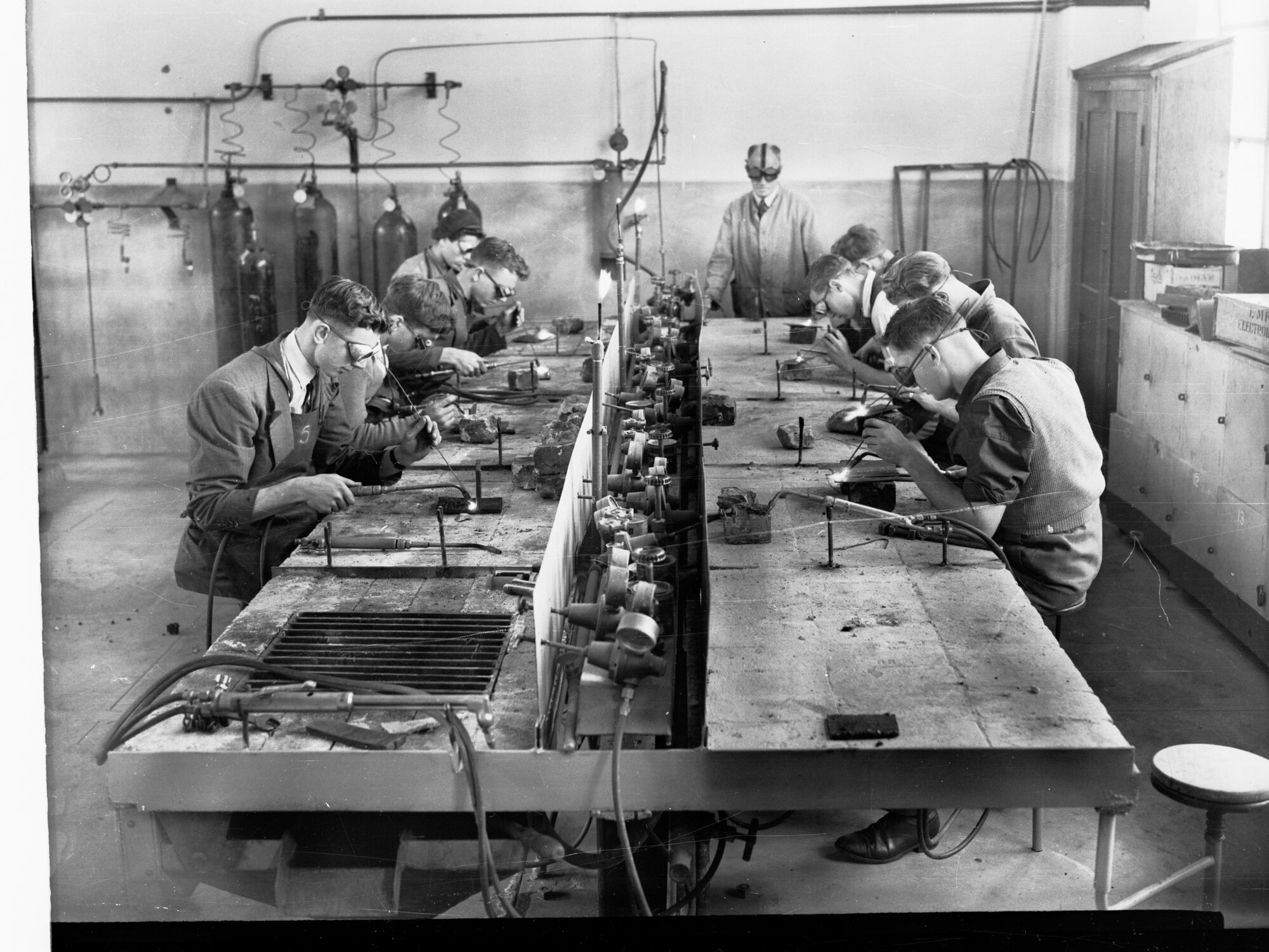 Students working in metal work room
