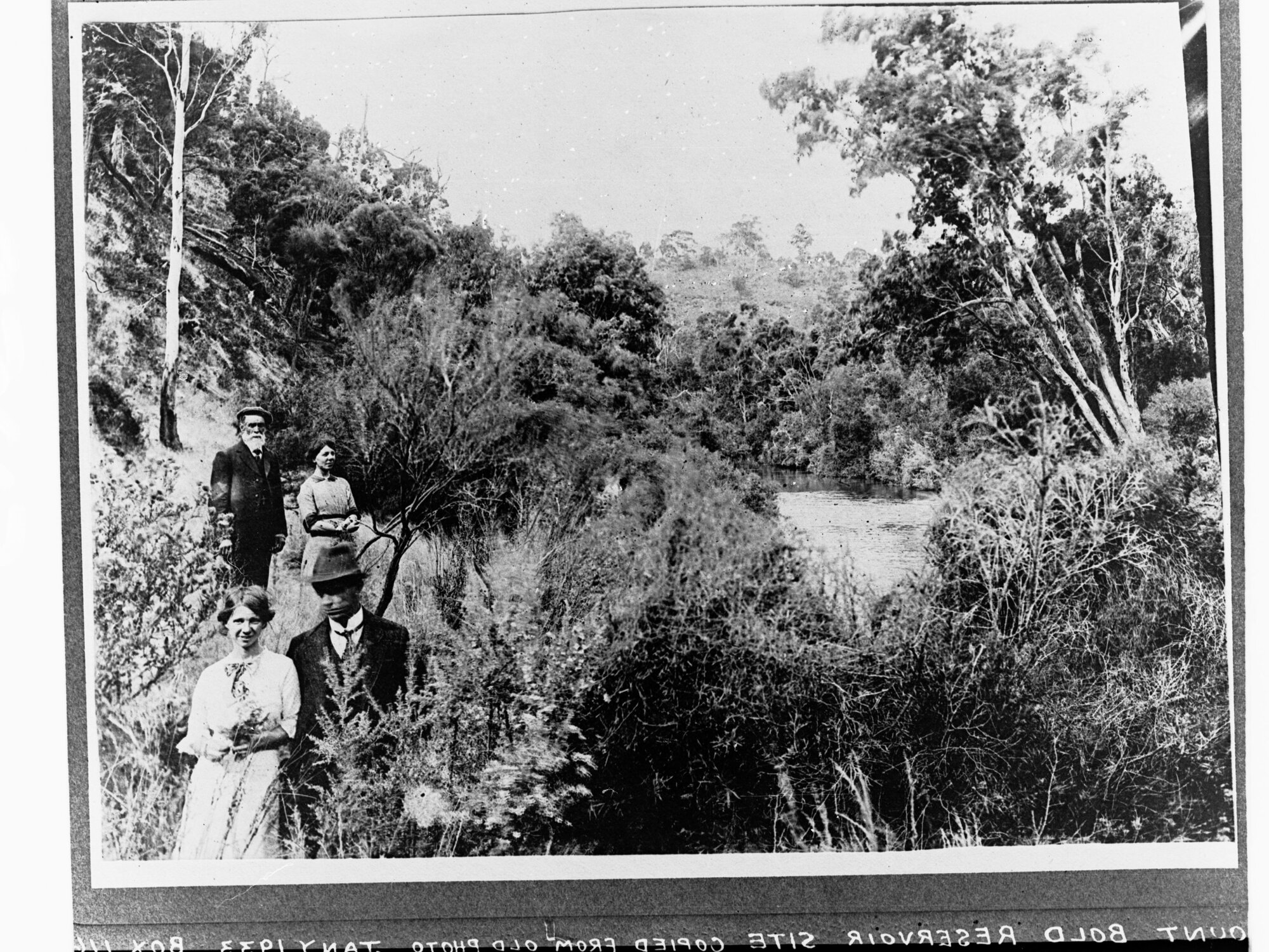 Site of Mount Bold Reservoir showing people walking through bush - (copied Jan. 1933)