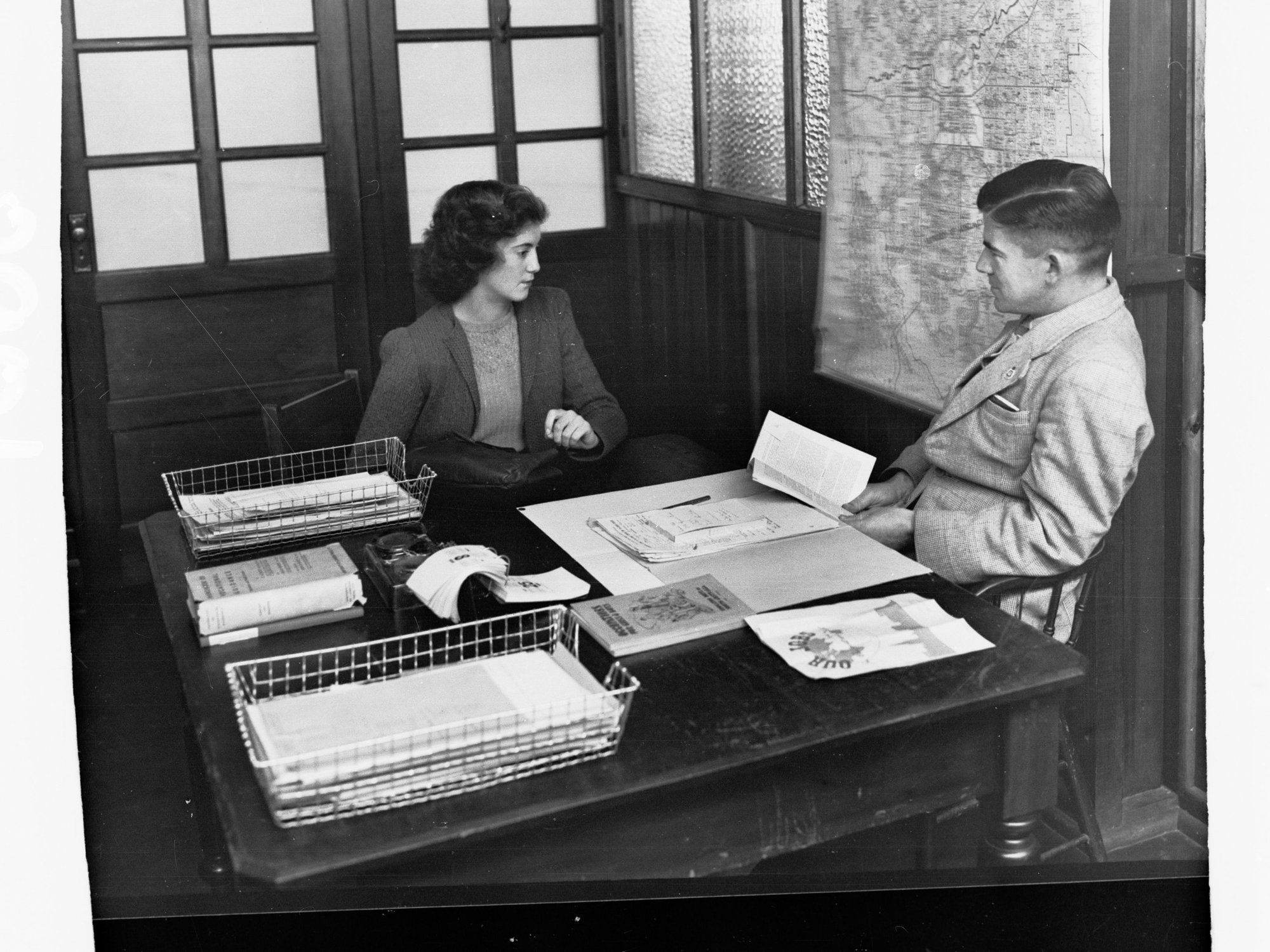 Vocational Guidance - Man and Woman at Desk