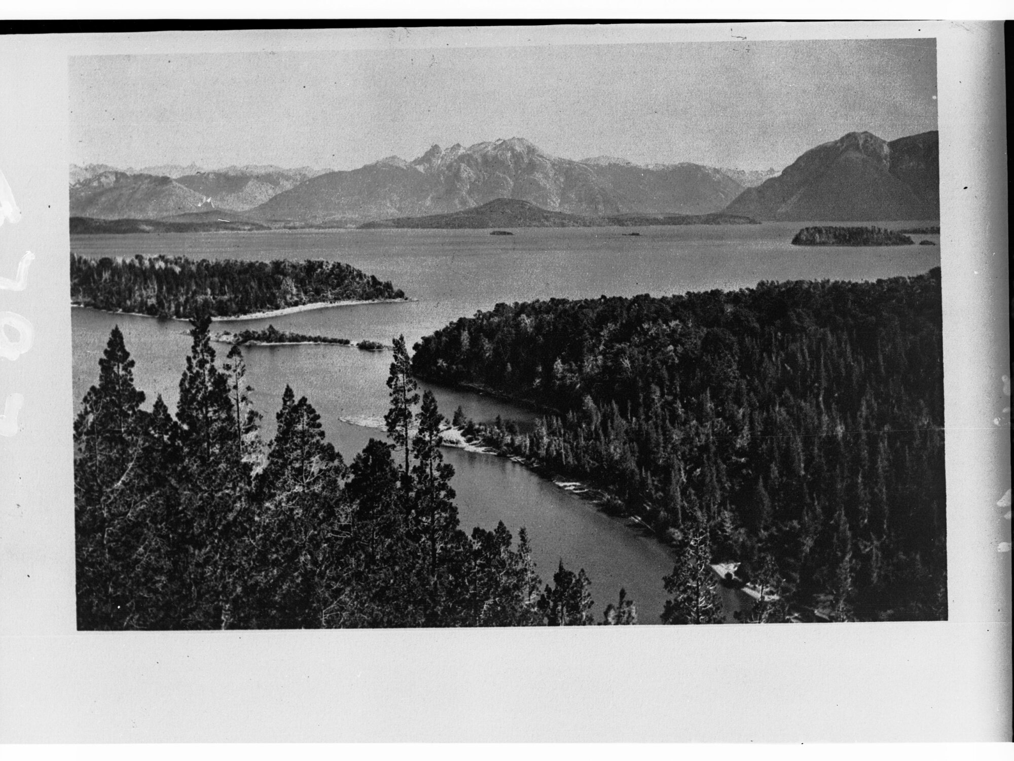 Lake Showing Mountains wit Pine Trees