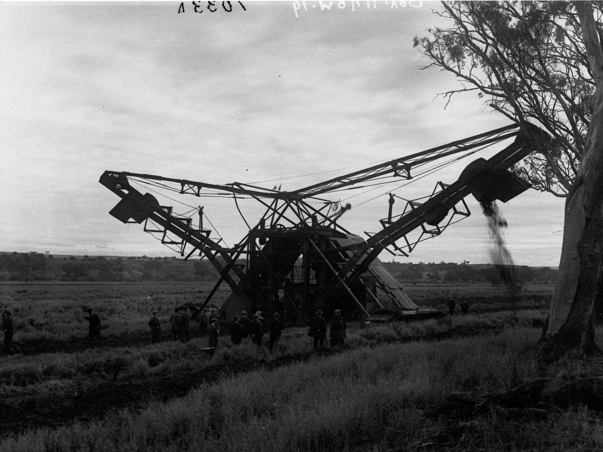 Machine digging irrigation channel from River Murray
