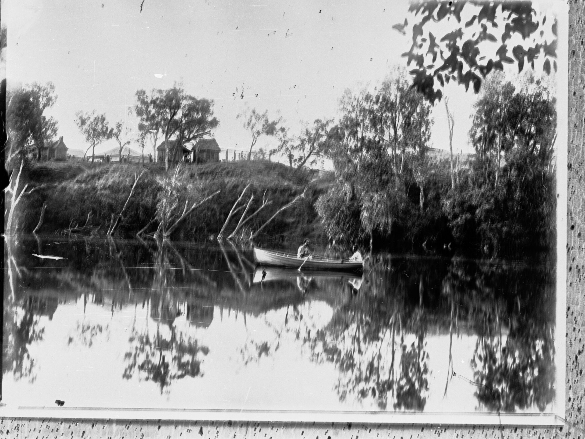 Views of Northern Territory,  area unknown (two men in row boat)