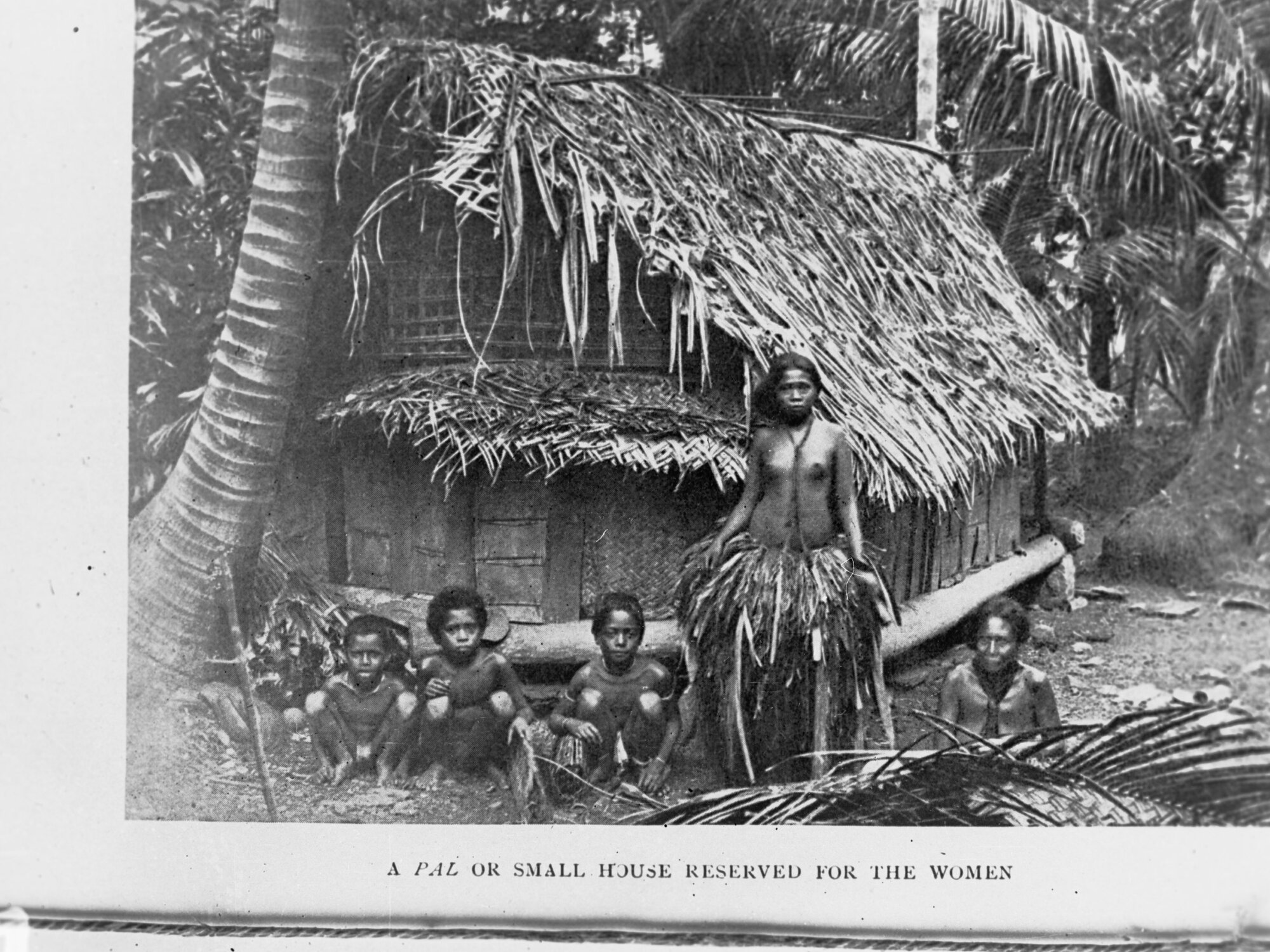 Pacific Island Women Outside of a Hut