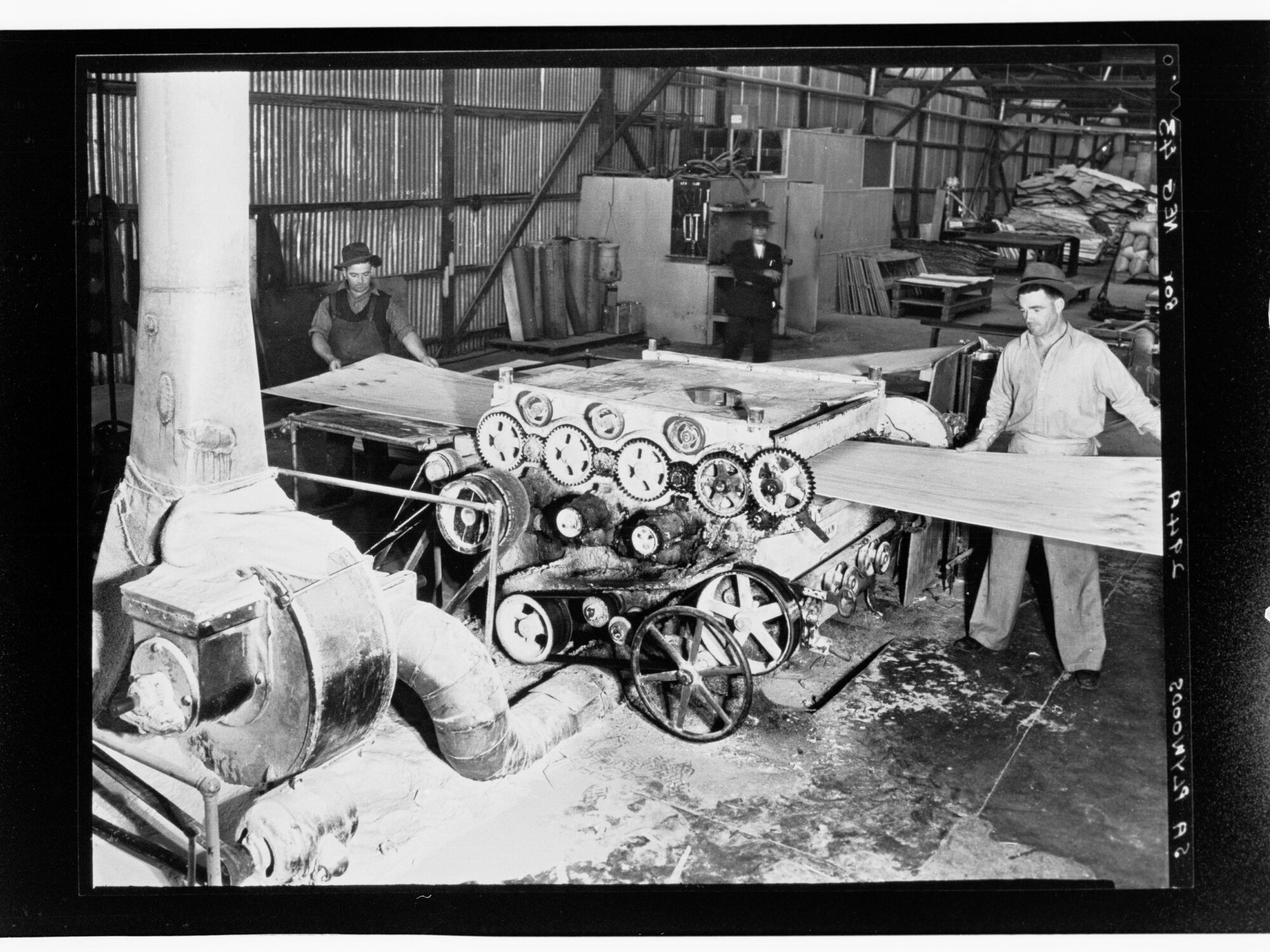 S.A. Plywoods - employees using equipment