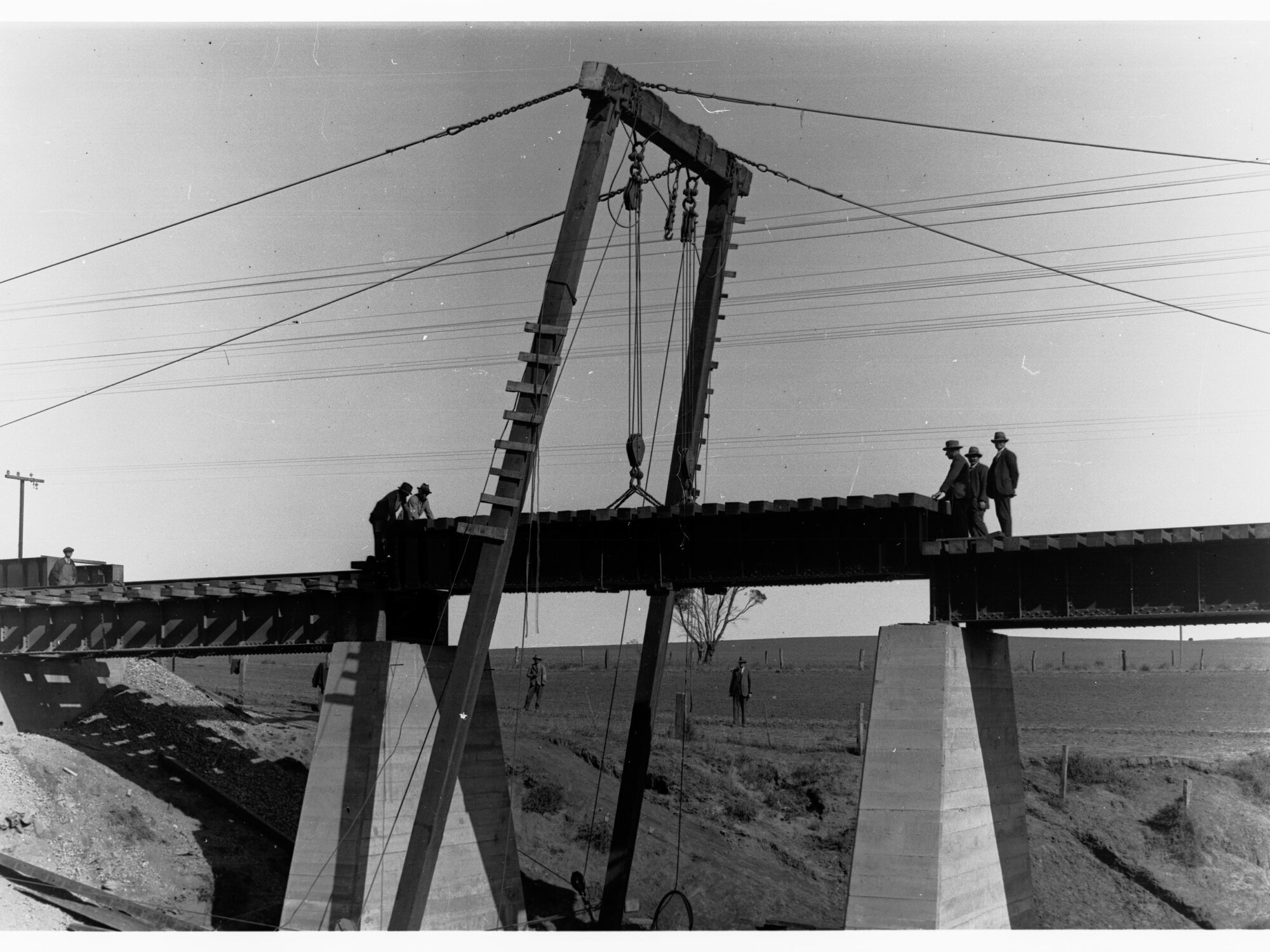 Railway Bridge over Pine Creek showing men working