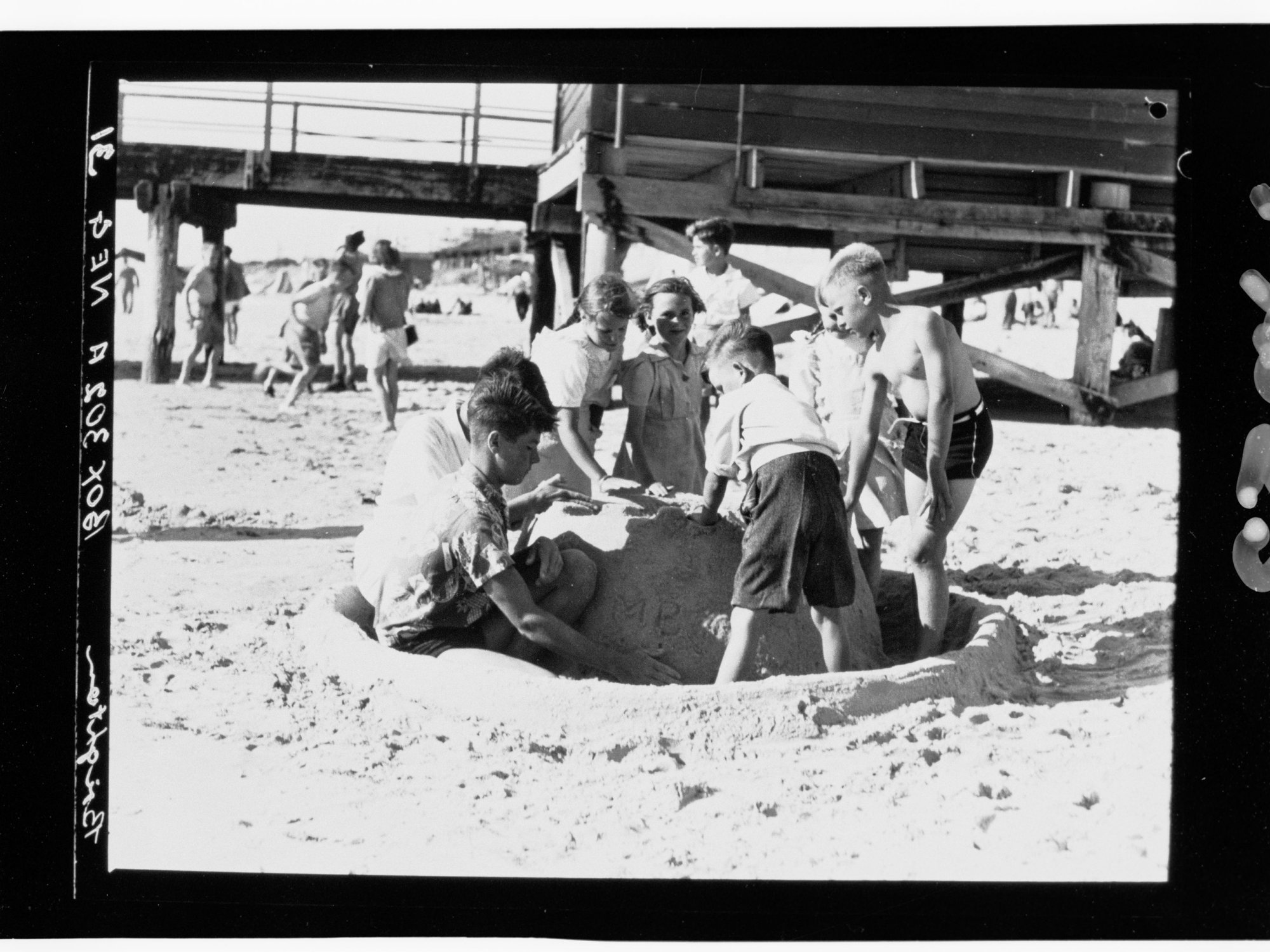 Brighton - children making sandcastle