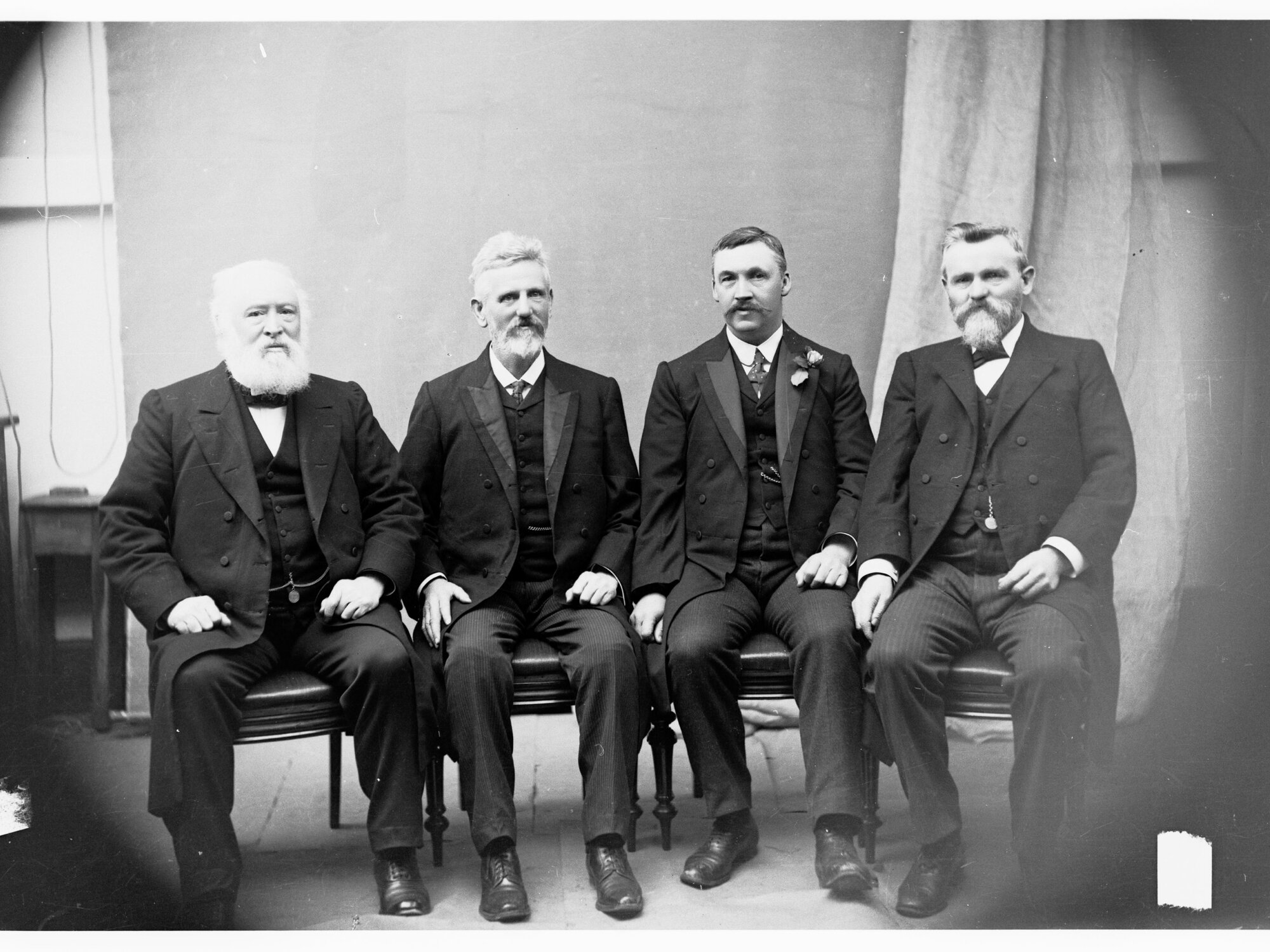 Group photograph of Price Ministry - left to right: A A Kirkpatrick, T Price, AH Peake and L O'Loughlin