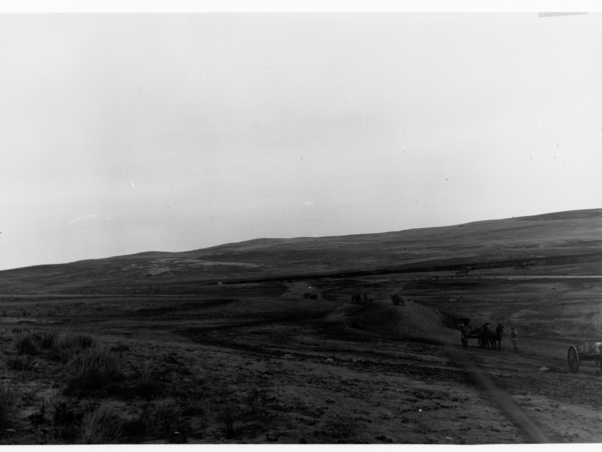 Bundaleer Reservoir - several horses and drays are carting material for the construction of the bank