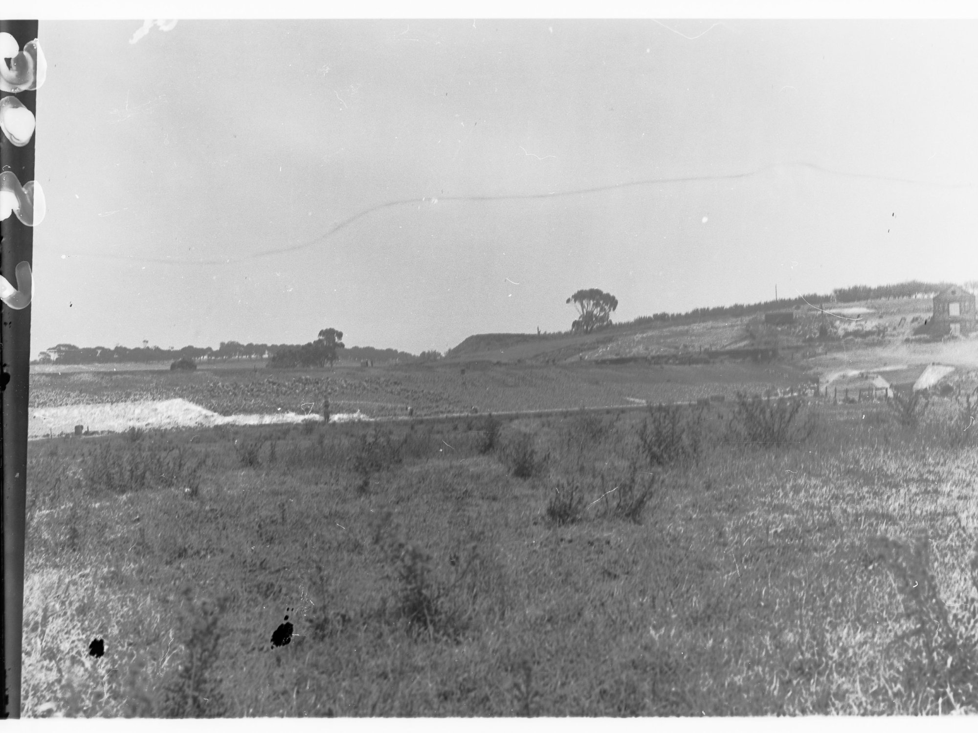 Happy Valley Waterworks - men working on digging of pipeline