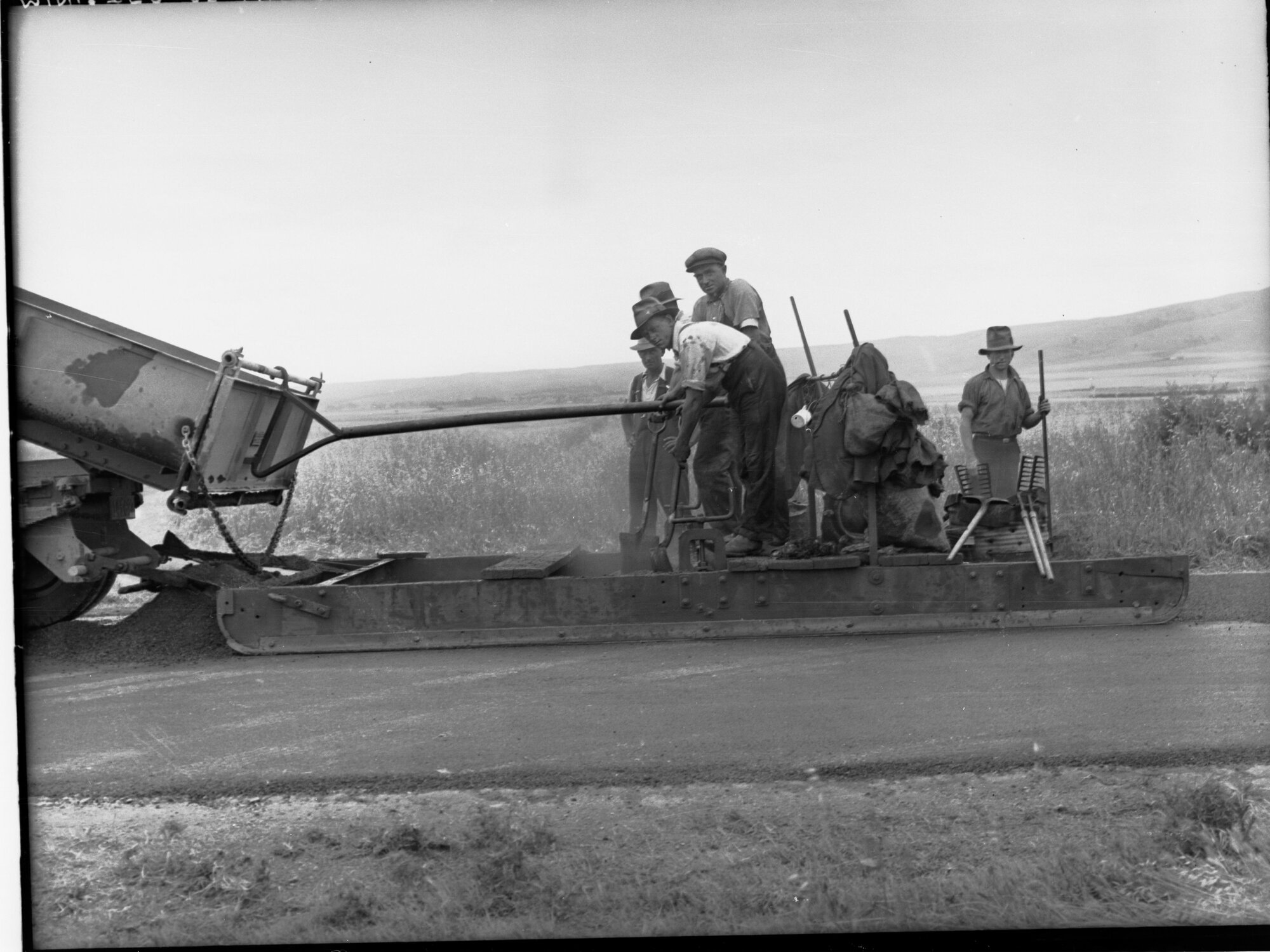 Men constructing roads at Noarlunga