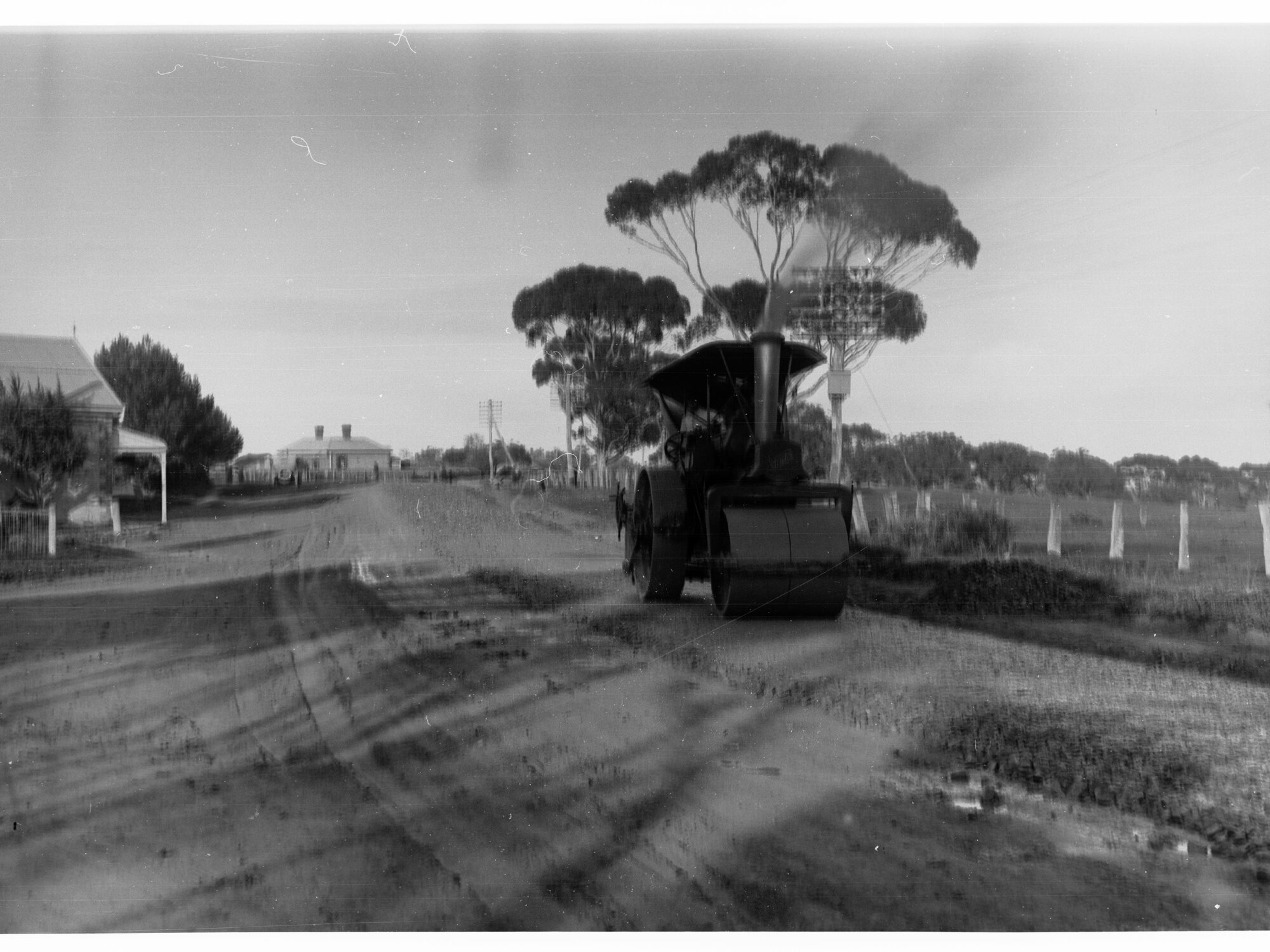 Steam Roller on Road Showing Housing