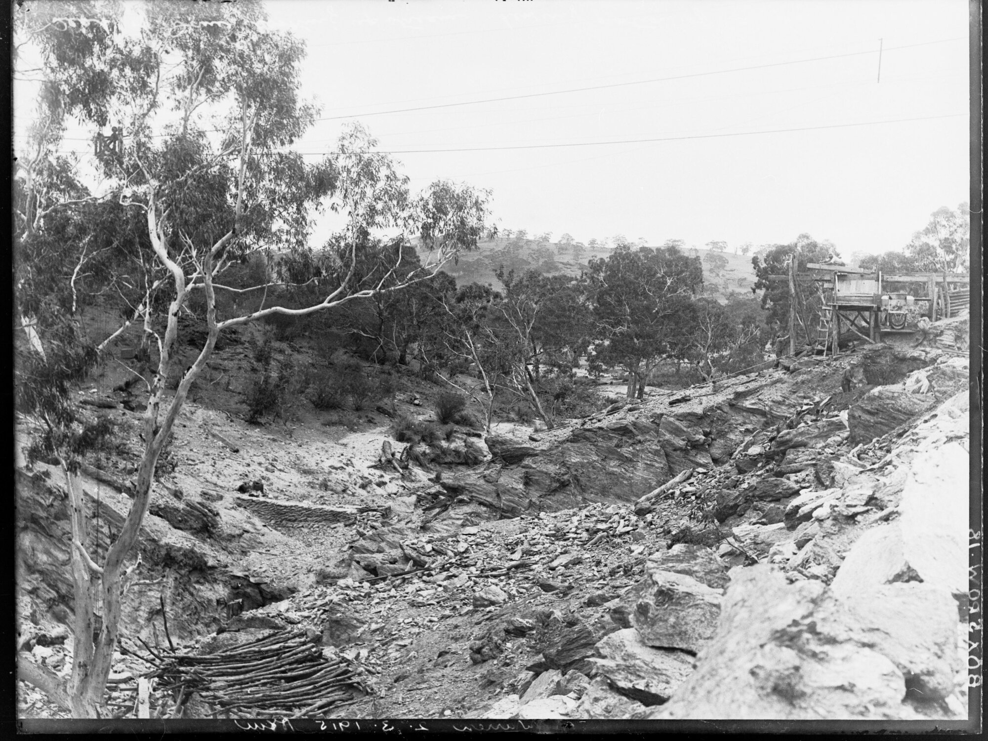 Construction of Warren Reservoir, South Australia seat of dam looking upstream showing portion of concrete mixer