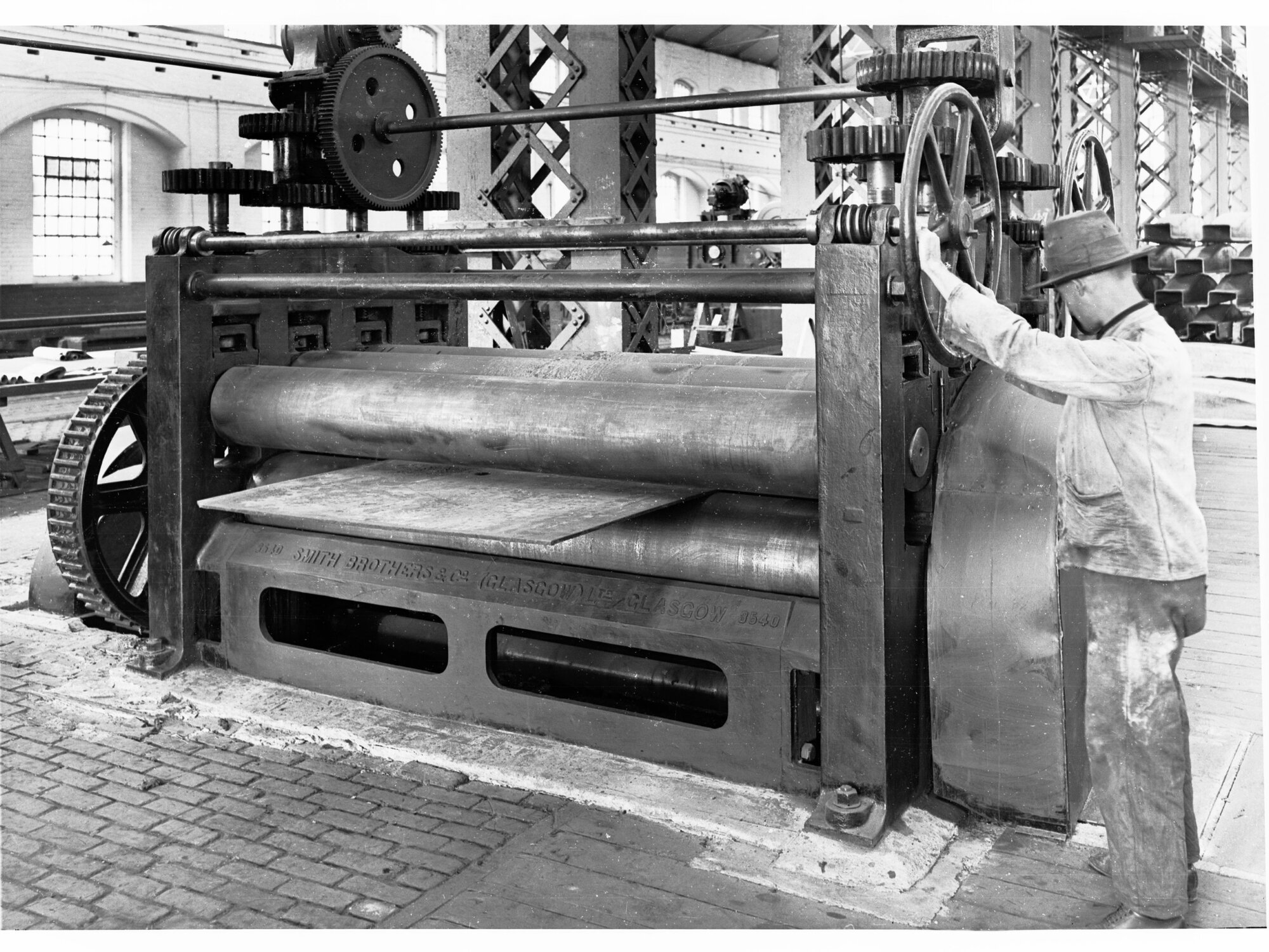 Man Working on Machine at Islington Railway Workshop