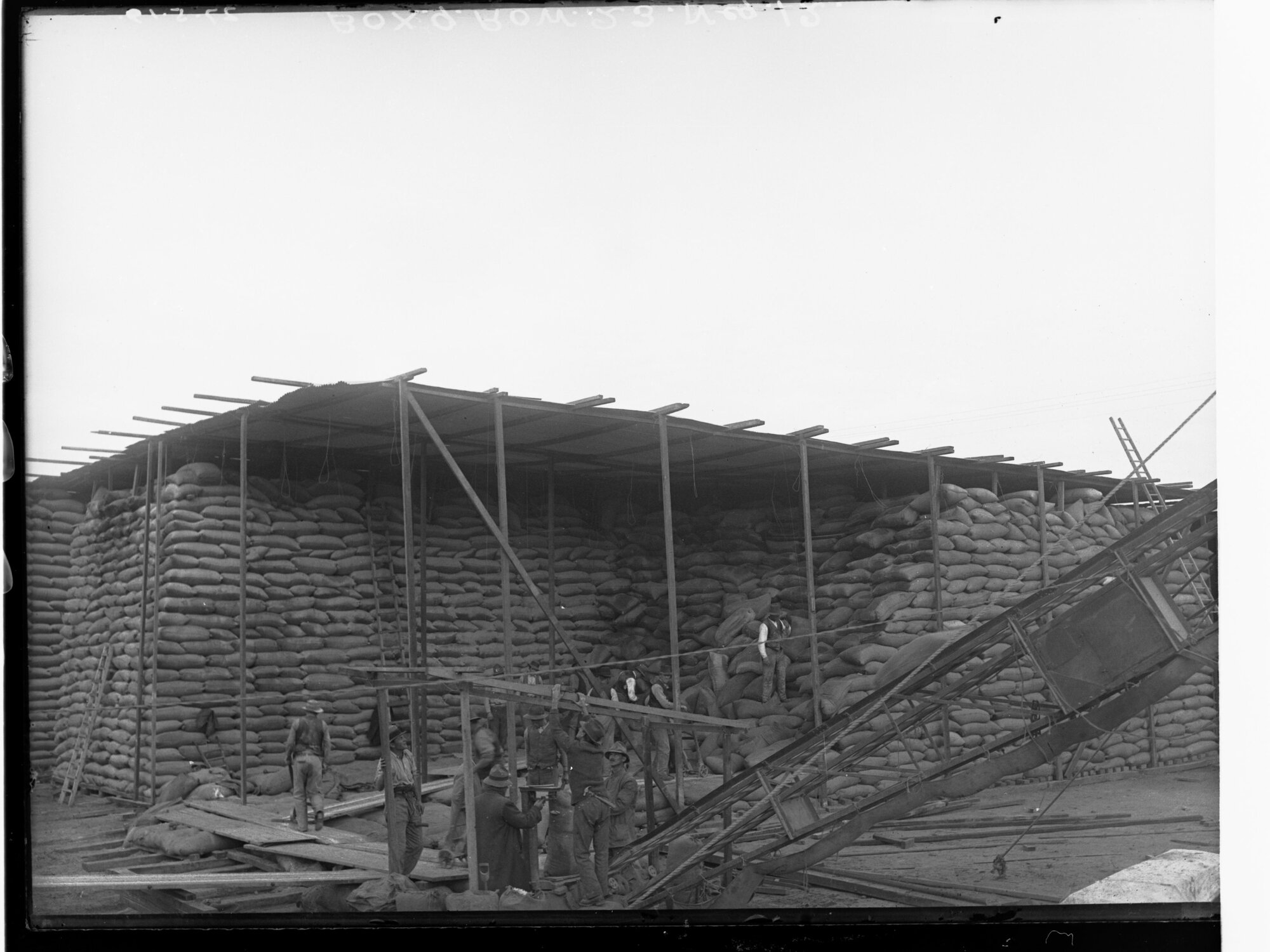 Men loading wheat sacks at Flour Mill Port Adelaide 