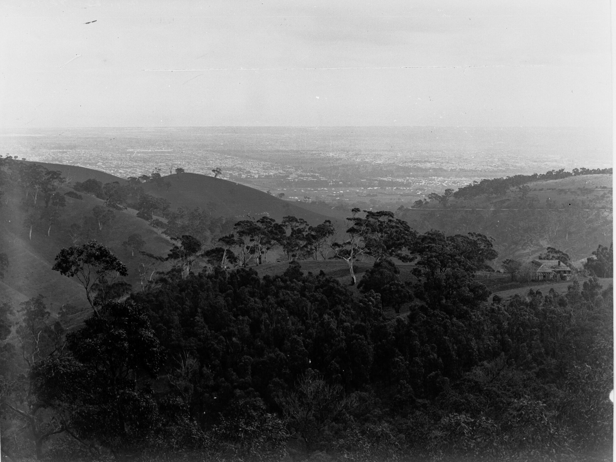 Tourist Bureau photo of  Waterfall Gully, South Australia, showing hills and trees
