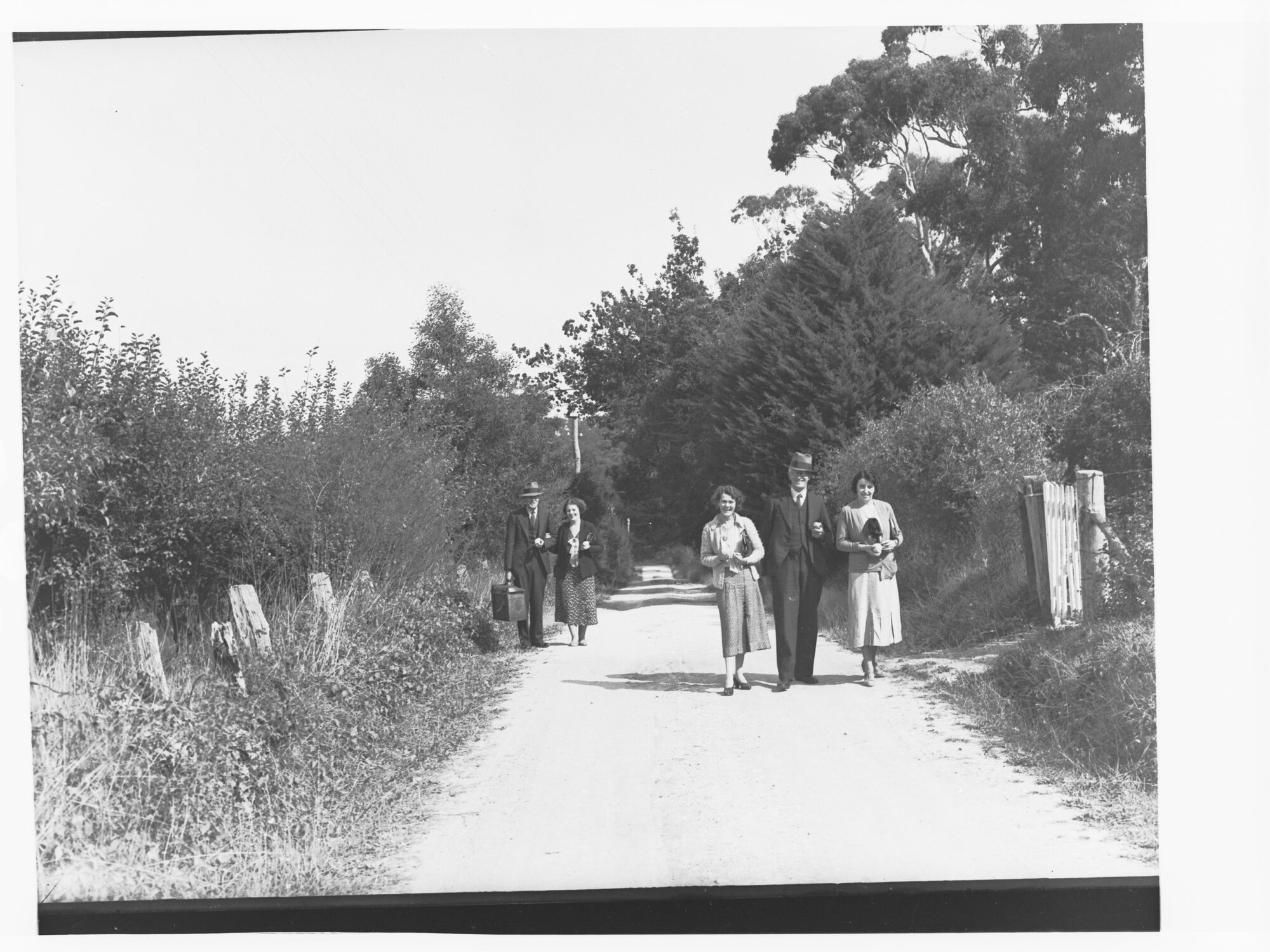 Men and women walking along road in Stirling