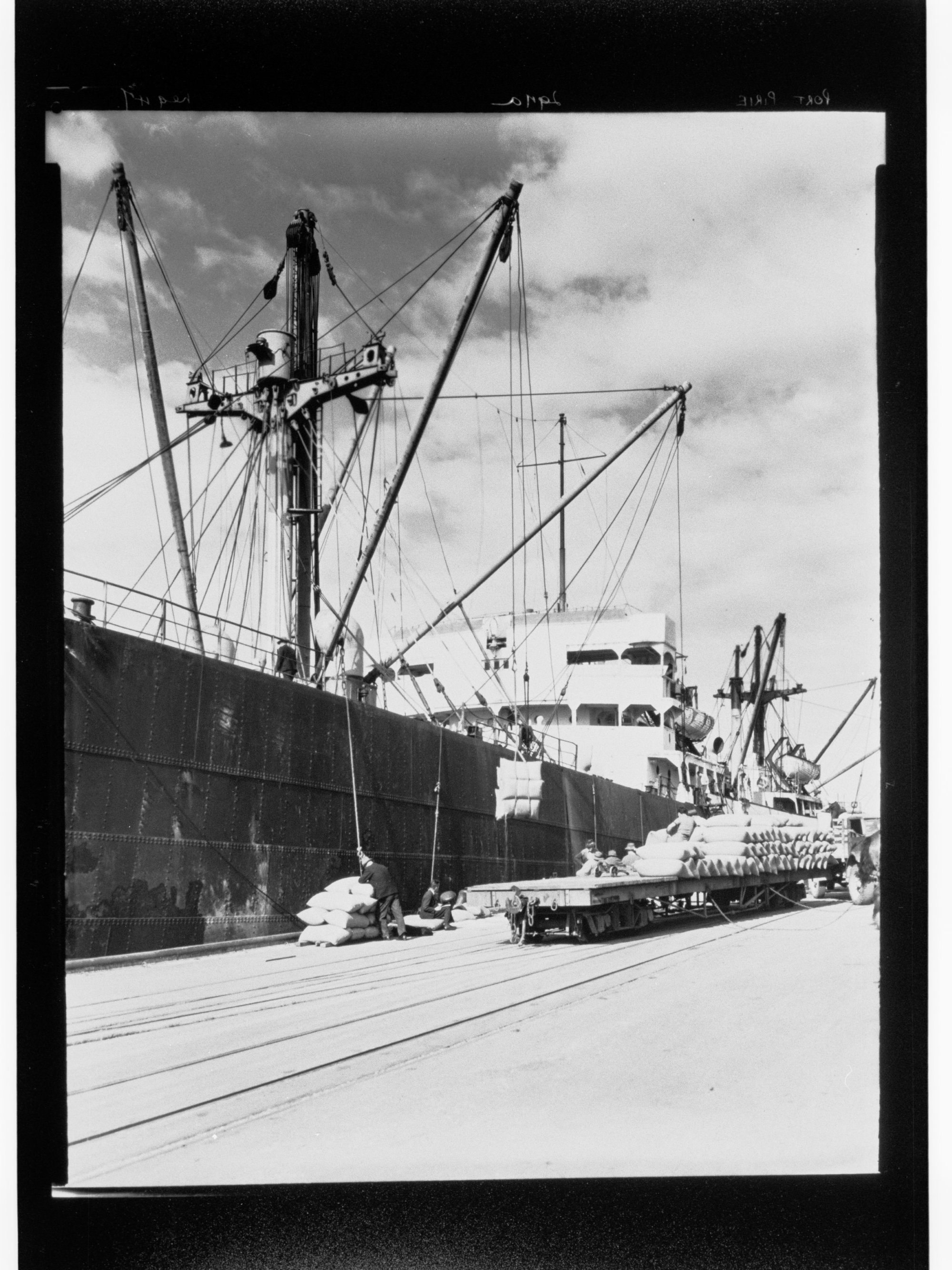 Port Pirie - goods being loaded/unloaded onto ship by crane