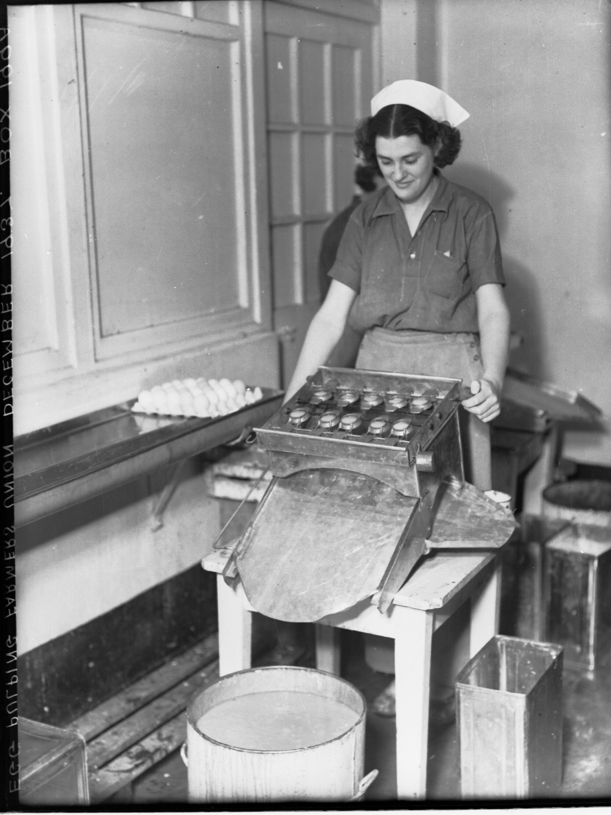 Woman egg pulping at Farmer's Union