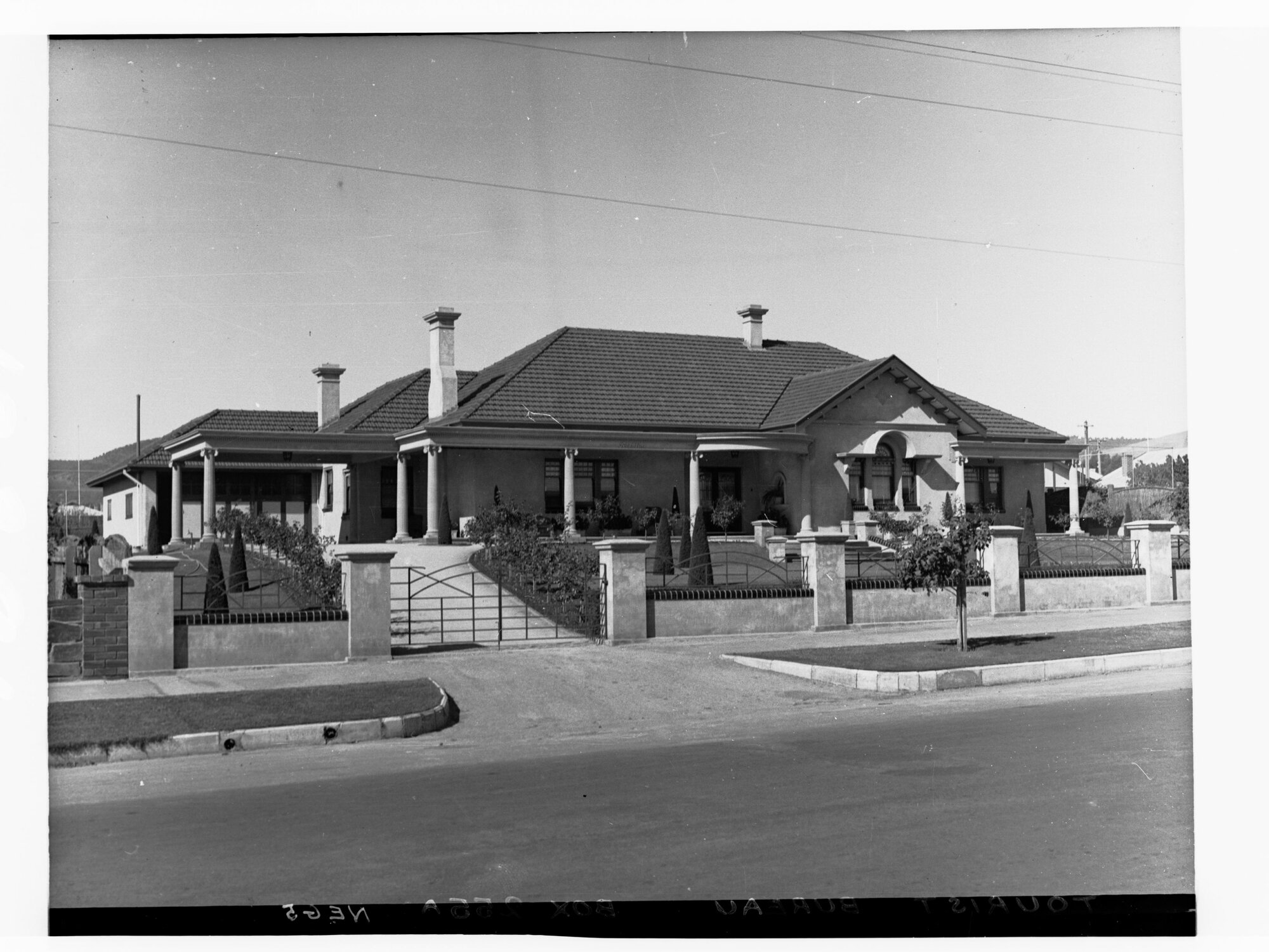 Tourist Bureau showing large house