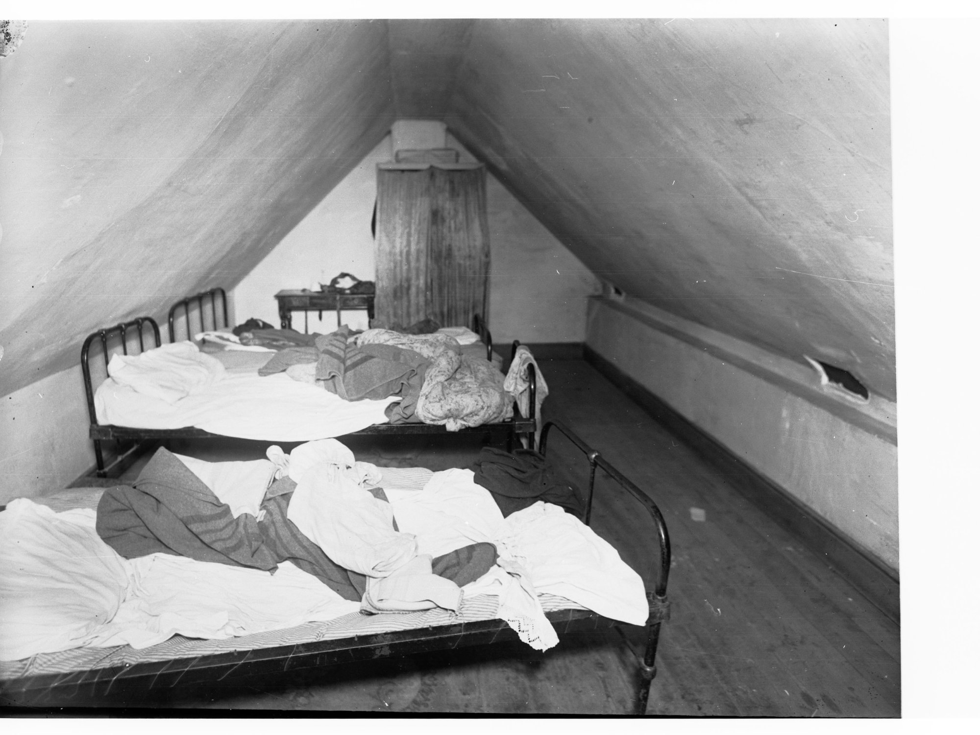 Unmade Beds in Dormitory