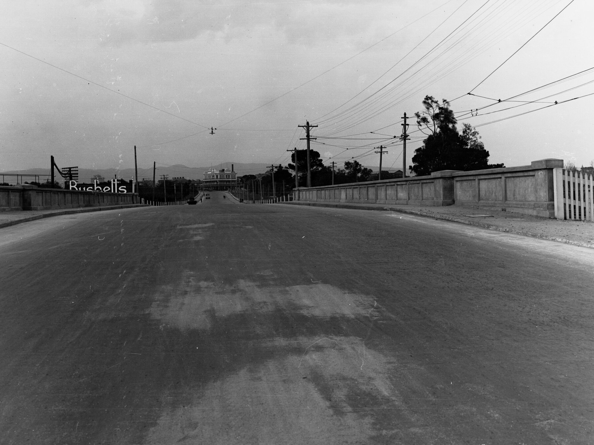 Bridge Over Railway Line on Port Road Showing Newmarket Hotel in Distance